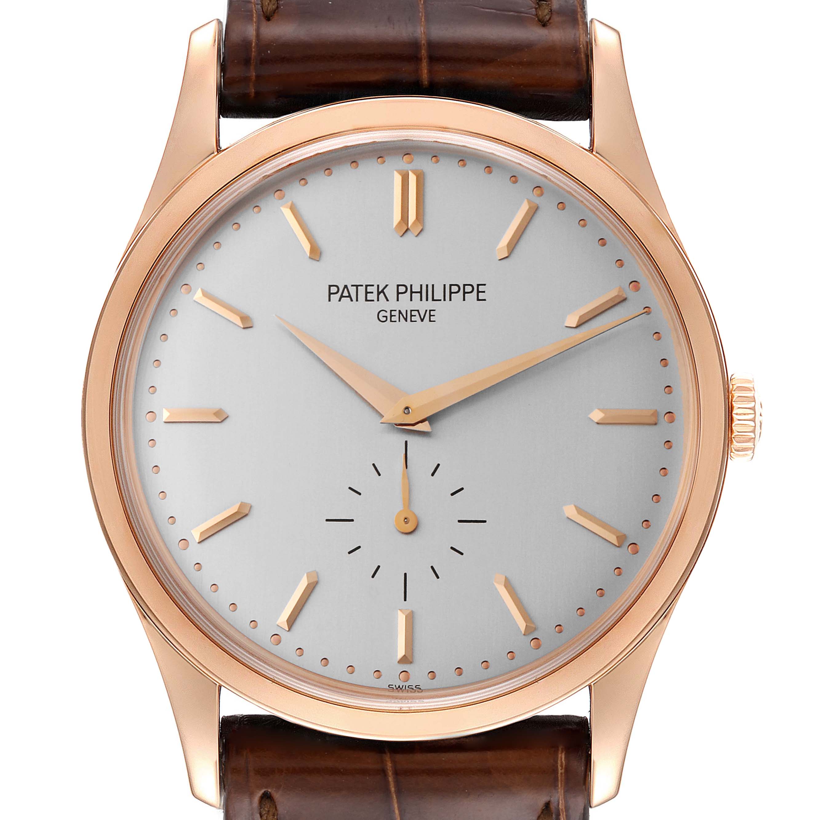 The image shows a Patek Philippe Calatrava 5196R Men
s Rose Gold Silver Dial 5196R Men
s Rose Gold Silver Dial watch from a front angle, highlighting its face, rose gold case, and leather strap.