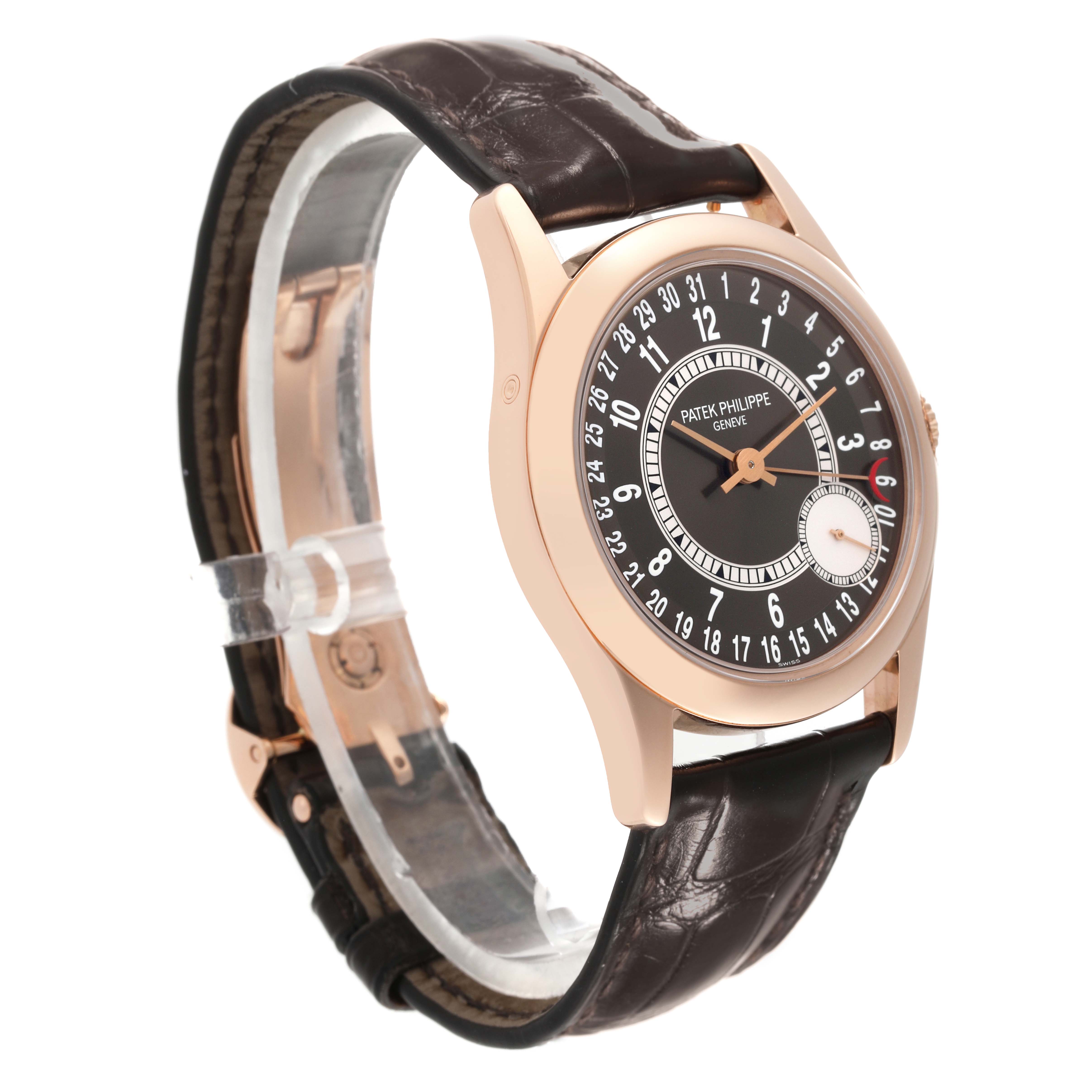 This image shows a Patek Philippe Calatrava 6000R-001 Men's Rose Gold Brown Dial 6000R-001 Men's Rose Gold Brown Dial watch from a three-quarter angle, highlighting its dial, case, and leather strap.