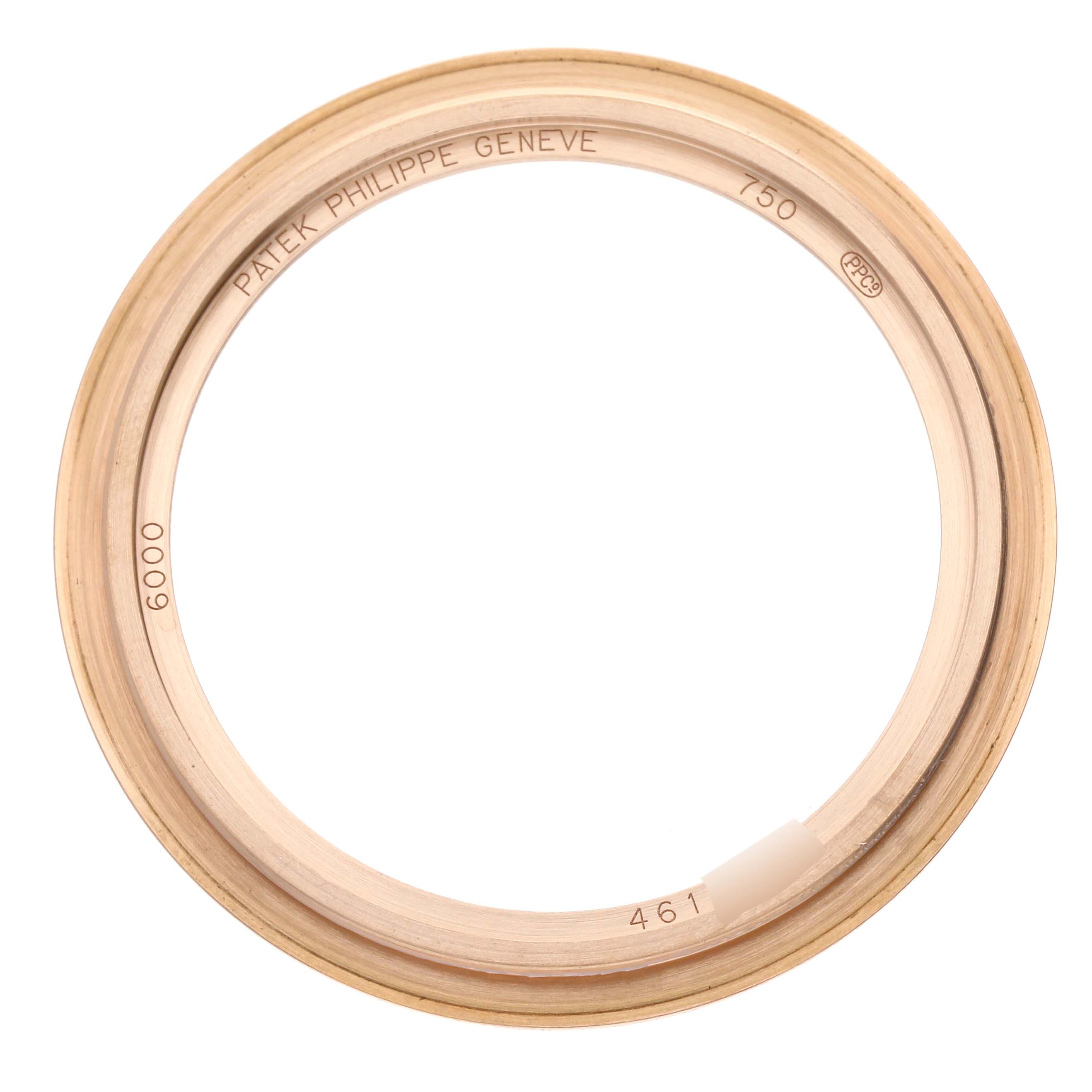 This image shows a top view of a caseback for a Patek Philippe Calatrava 6000R-001 Men's Rose Gold Brown Dial 6000R-001 Men's Rose Gold Brown Dial watch.