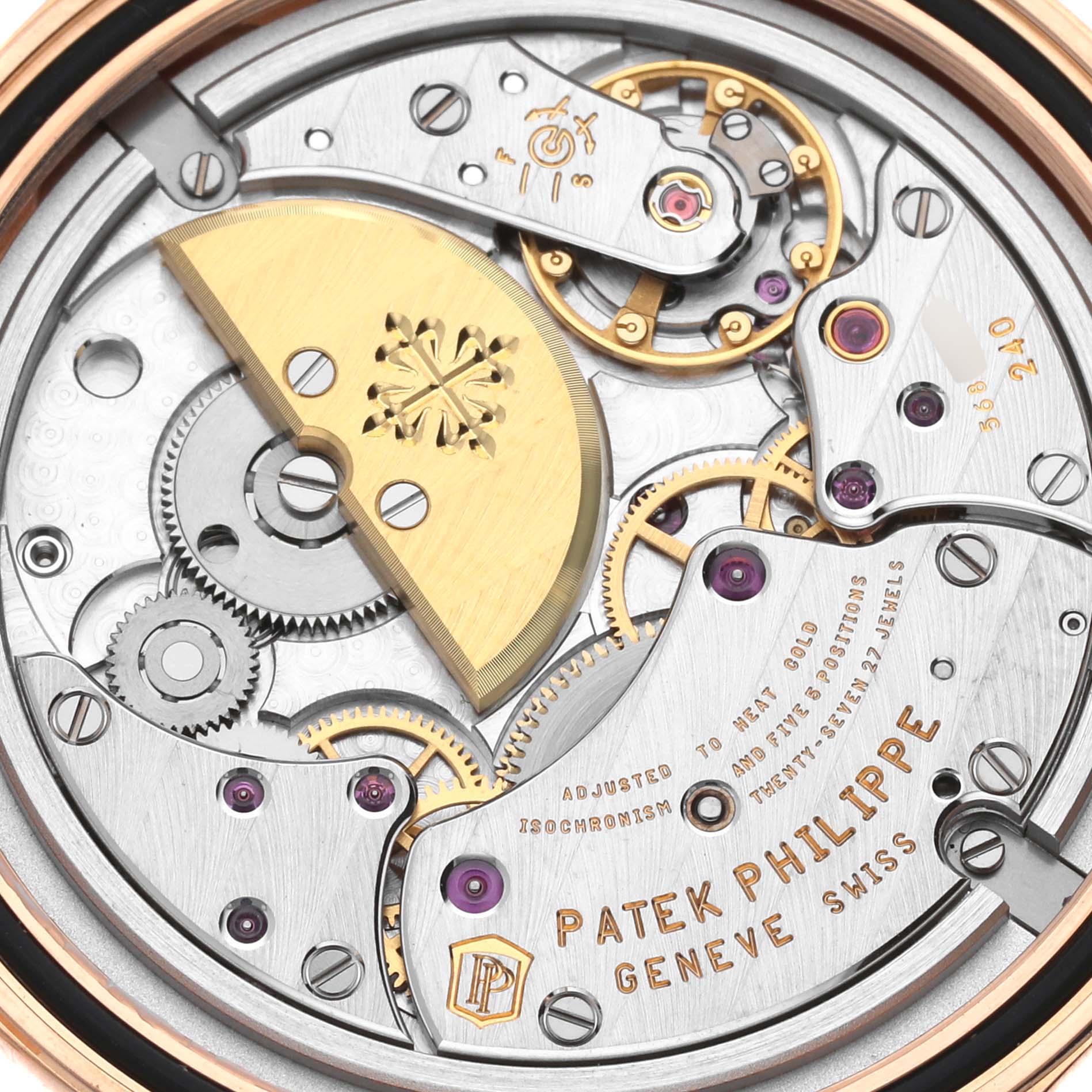 This is a close-up view of the movement of a Patek Philippe Calatrava 6000R-001 Men's Rose Gold Brown Dial 6000R-001 Men's Rose Gold Brown Dial watch, showing gears, screws, and the rotor.