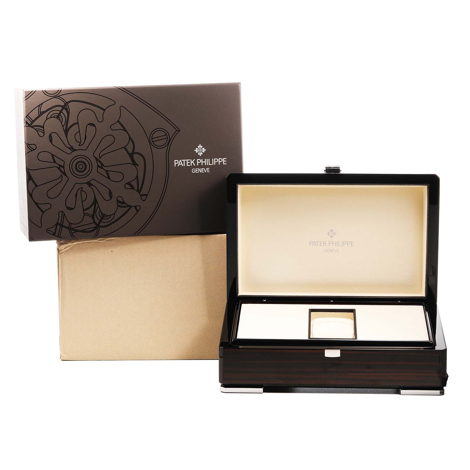 The image shows a Patek Philippe Complications 5146G-001 Men's White Gold White Dial watch presentation box from a front angle, along with its outer box.