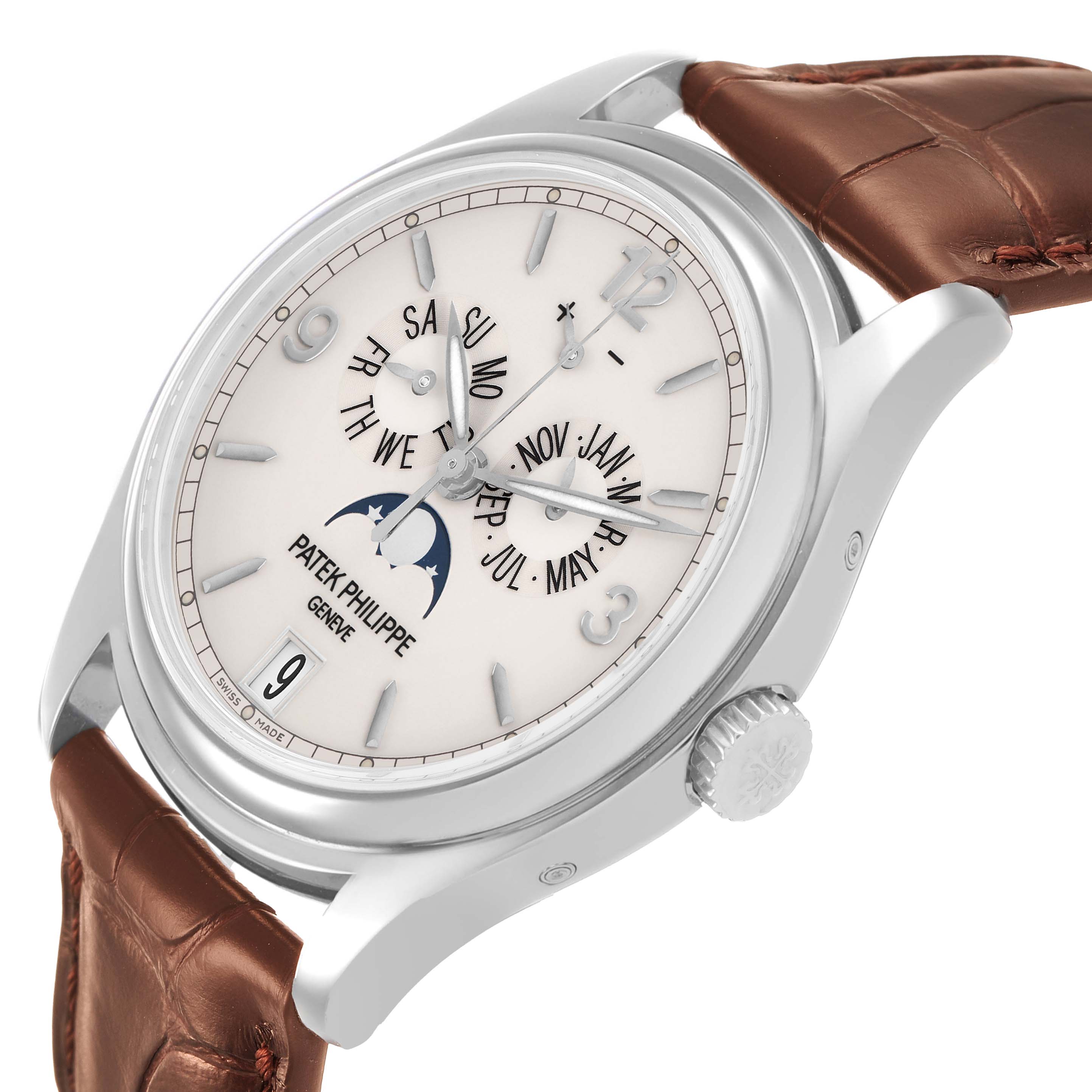 The Patek Philippe Complications 5146G-001 Men's White Gold White Dial watch is shown at an angled side view, highlighting the dial, bezel, crown, and part of the leather strap.