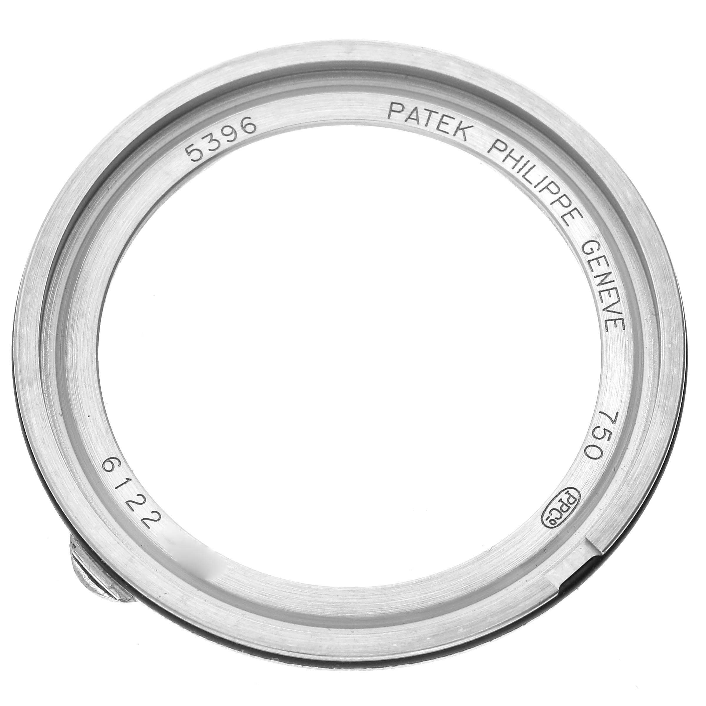 This is the case back of a Patek Philippe Complications 5396G-014 Men
s White Gold Silver Dial 5396G-014 Men
s White Gold Silver Dial model 5396, showing inscriptions and a hallmark.