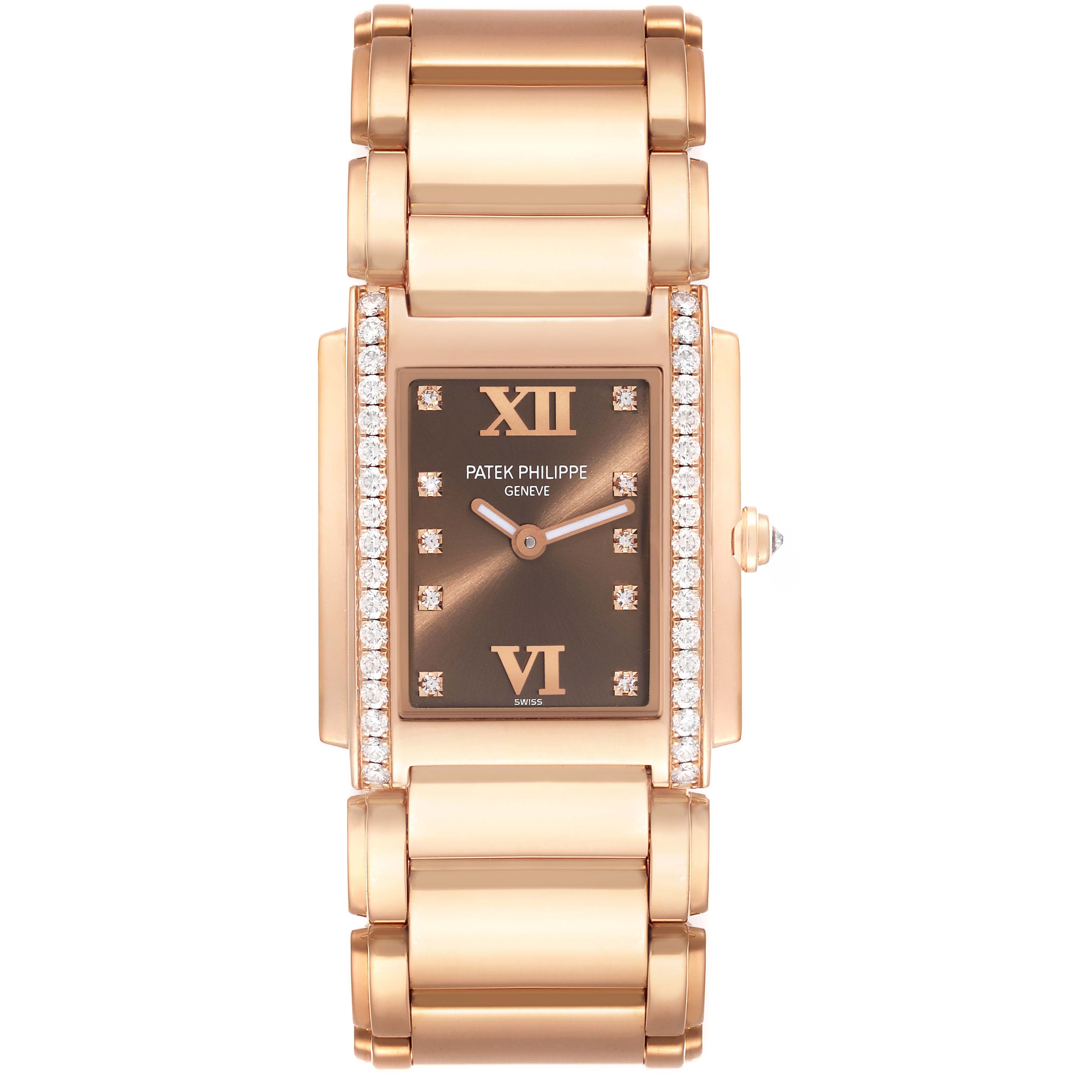 The image shows a front view of the Patek Philippe Twenty-4 4910/11R Women's Rose Gold Brown Dial 4910/11R Women's Rose Gold Brown Dial watch, highlighting its dial, hour markers, hands, and bracelet.