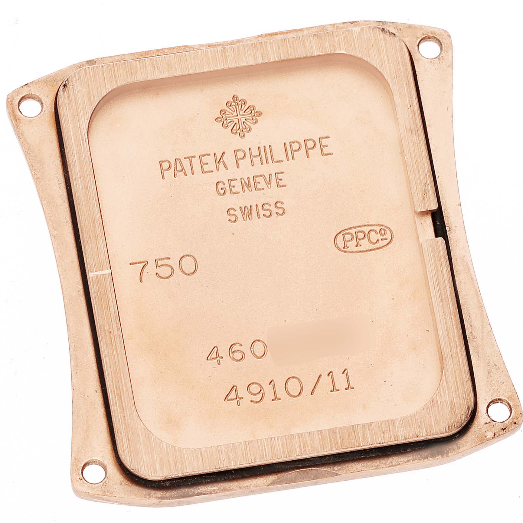 This image shows the back case of the Patek Philippe Twenty-4 4910/11R Women's Rose Gold Brown Dial 4910/11R Women's Rose Gold Brown Dial model watch, featuring the brand's engravings and reference numbers.