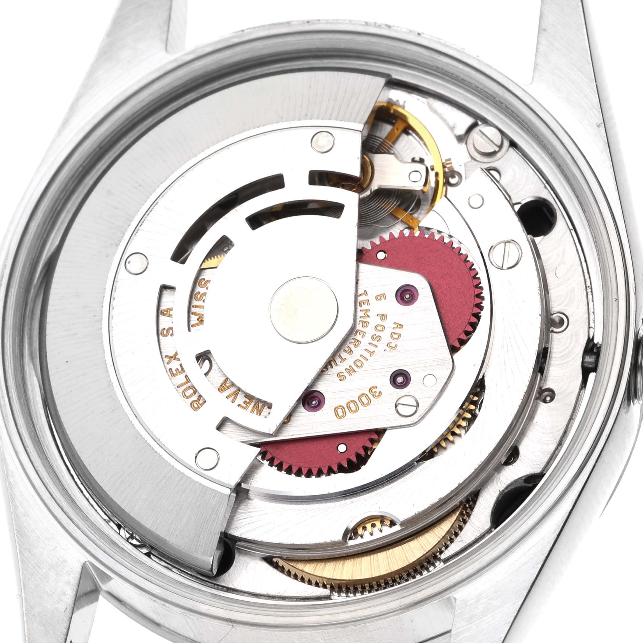 This image shows the internal movement mechanism of a Rolex Air-King 14000 Men's Stainless Steel Black Dial 14000 Men's Stainless Steel Black Dial watch from a top-down angle, focusing on the rotor and gears.