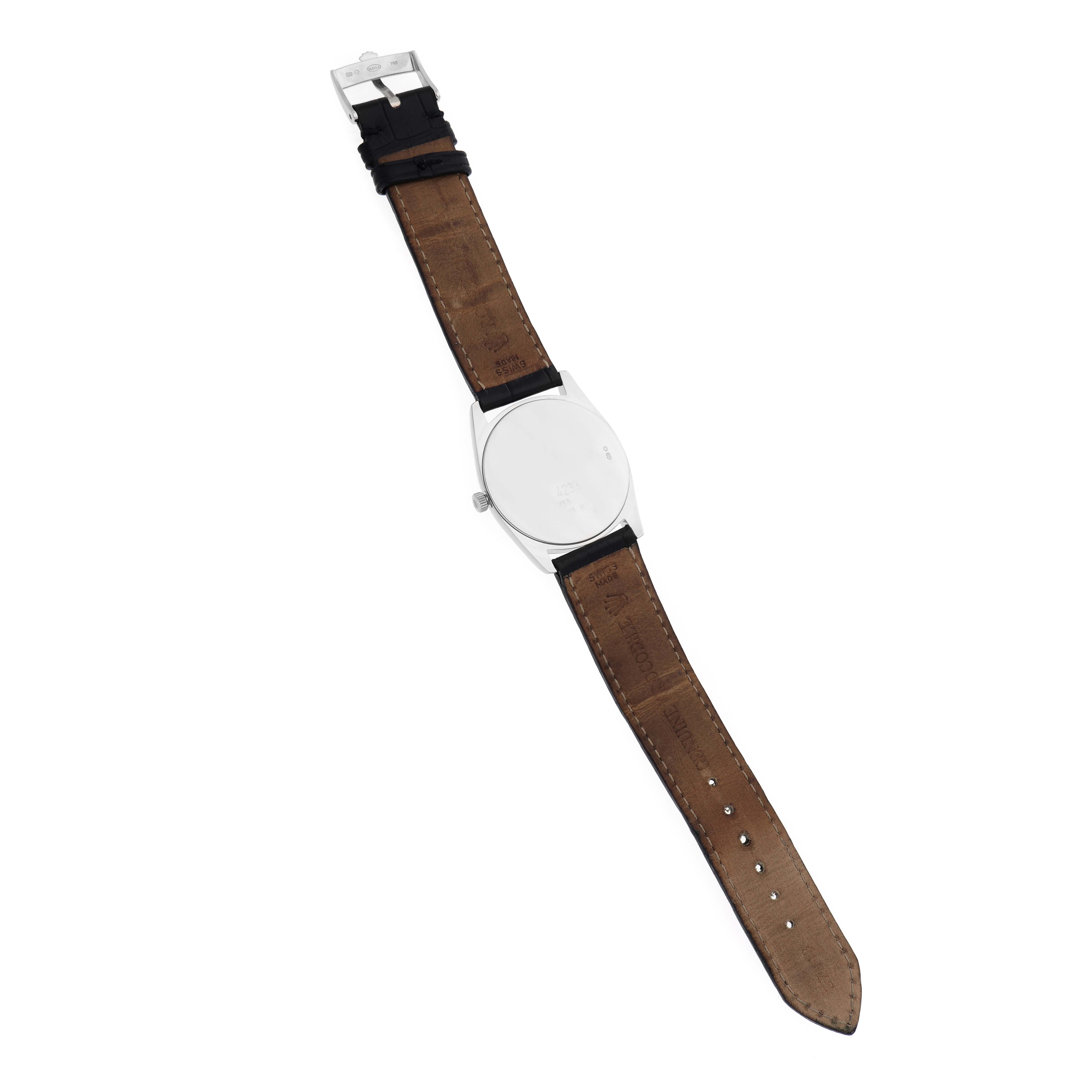 The Rolex Cellini 4233 Men's White Gold White Dial watch is displayed from the back, showing the full leather strap and buckle.