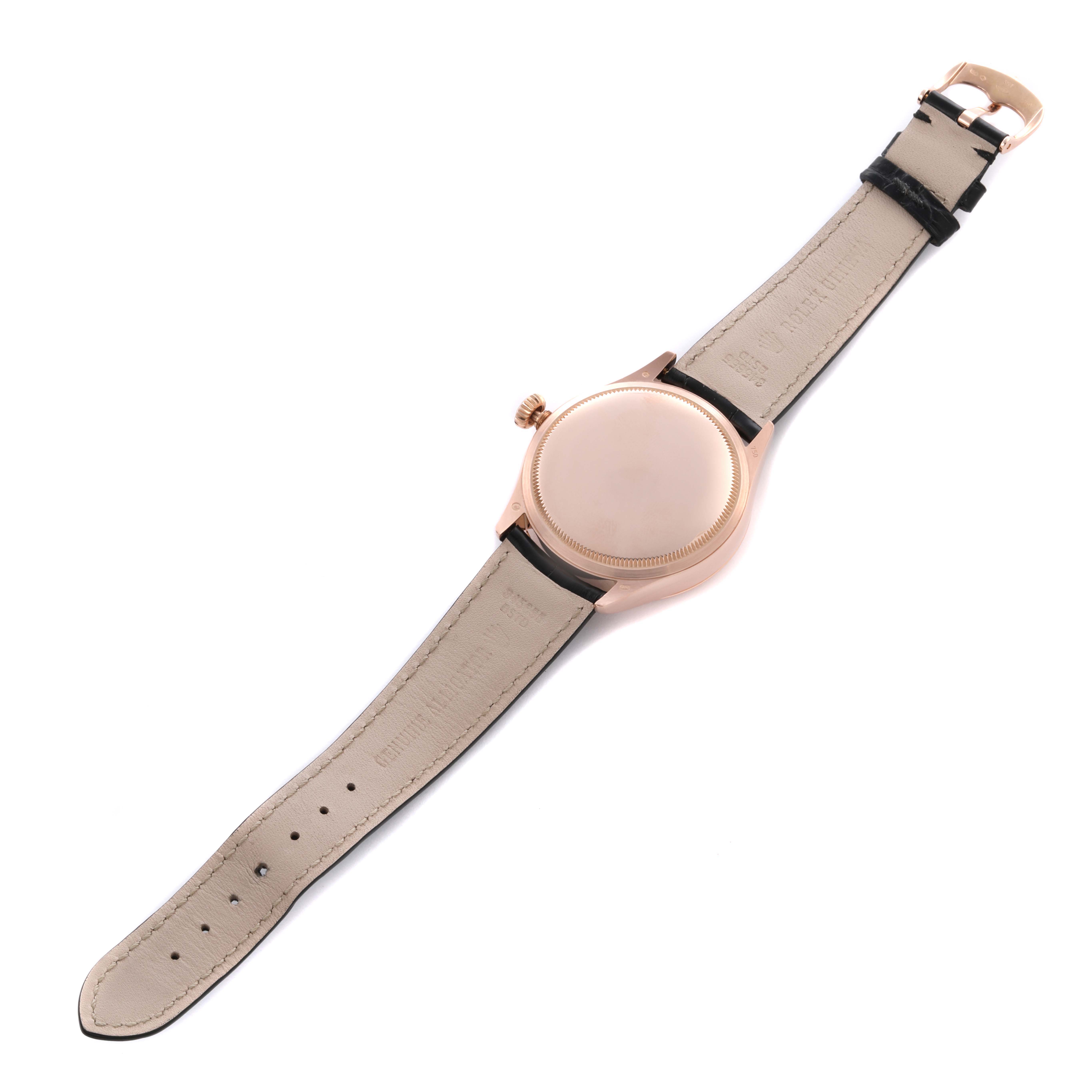 The Rolex Cellini 50525 Men's Rose Gold Brown Dial watch is shown from the back, highlighting the strap, buckle, and caseback.