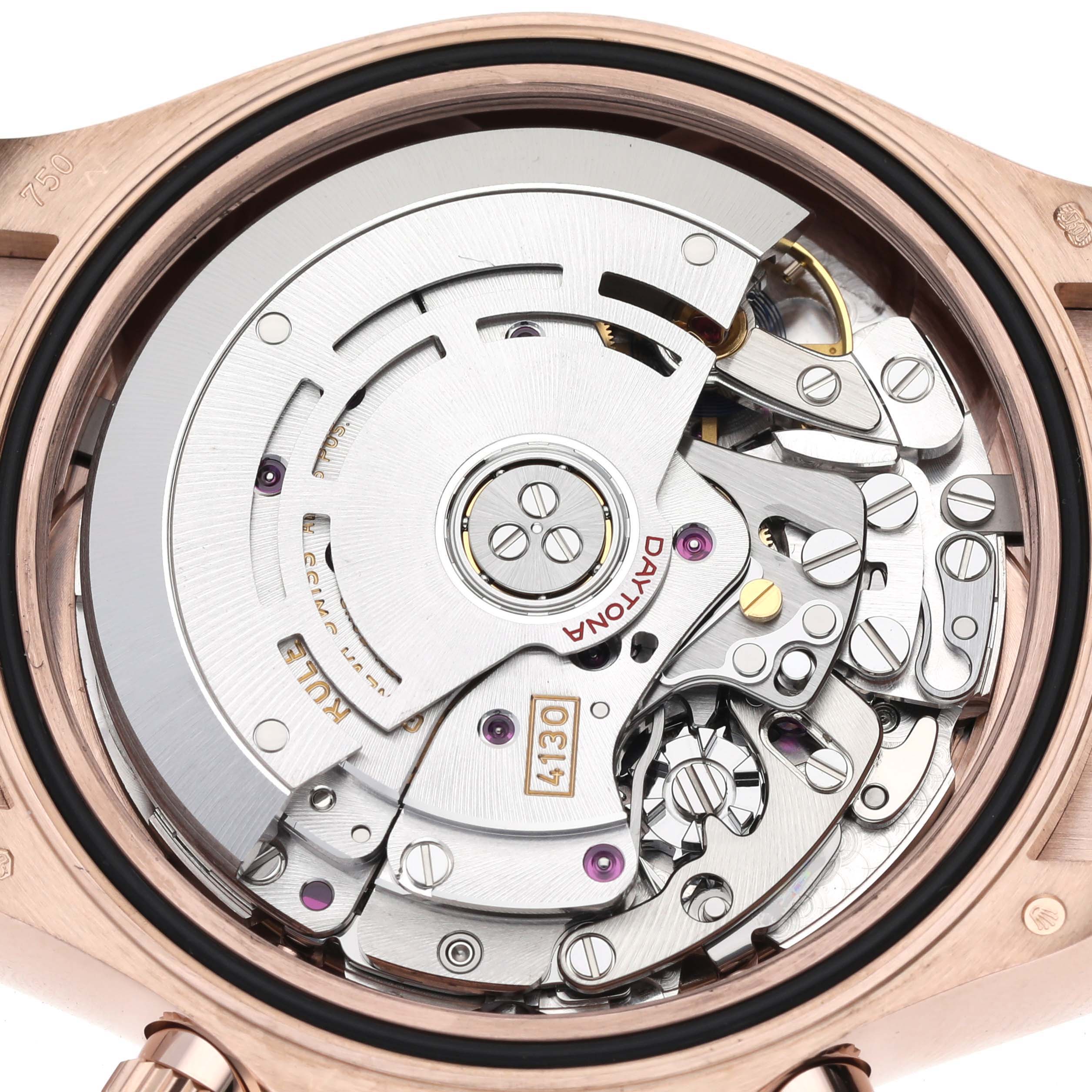 This image shows the intricate internal movement mechanism of a Rolex Daytona 116515LN Men
s Rose Gold White Dial 116515LN Men
s Rose Gold White Dial watch from a rear angle.