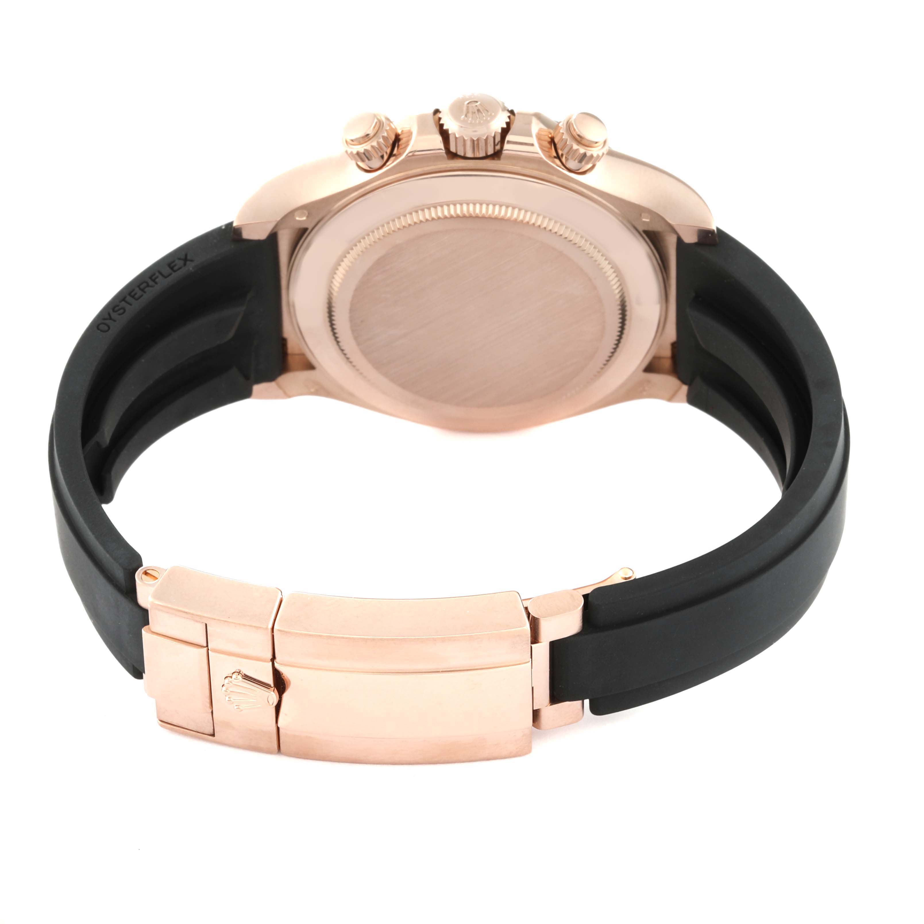 This image shows the back view of a Rolex Daytona 116515LN Men
s Rose Gold White Dial 116515LN Men
s Rose Gold White Dial watch, highlighting the case back, crown, pushers, and Oysterflex strap.