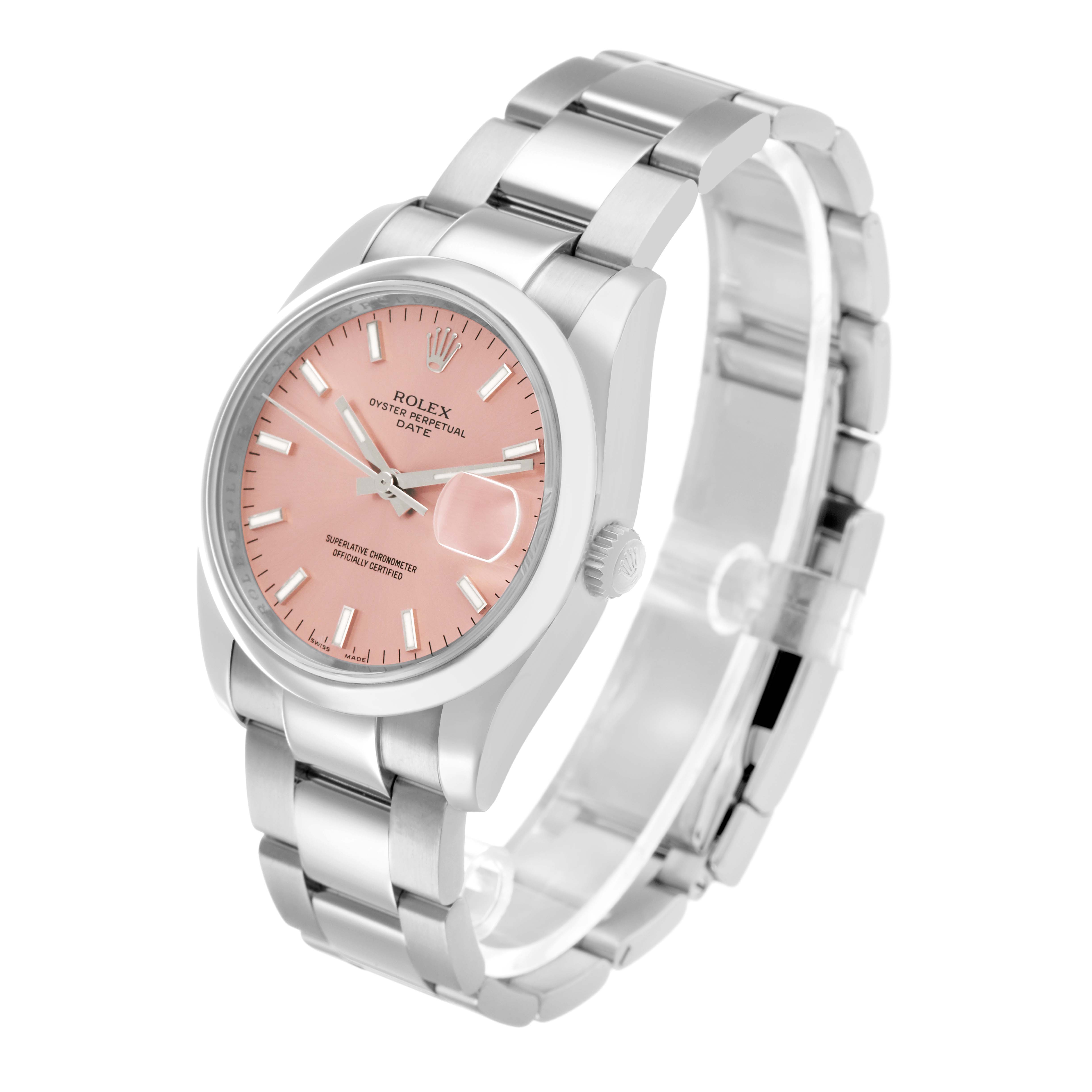 The Rolex Date 115200 Men's Stainless Steel Pink Dial model watch is shown at an angled view, highlighting the pink dial, bracelet, and crown.
