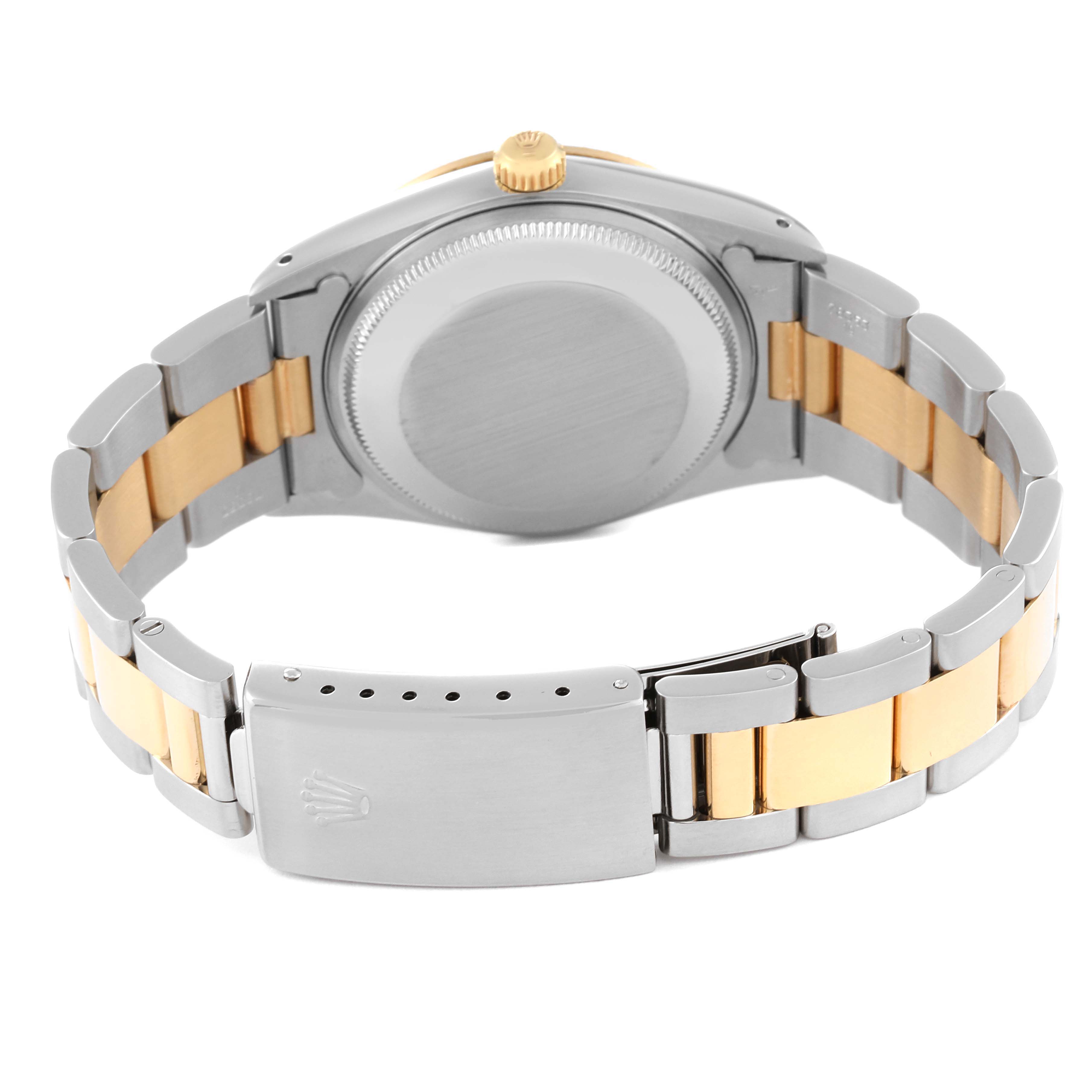 The image shows the back view of the Rolex Date 15223 Men's Steel and Gold (two tone) Champagne Dial 15223 Men's Steel and Gold (two tone) Champagne Dial model watch, highlighting the case back and two-tone bracelet with the clasp.