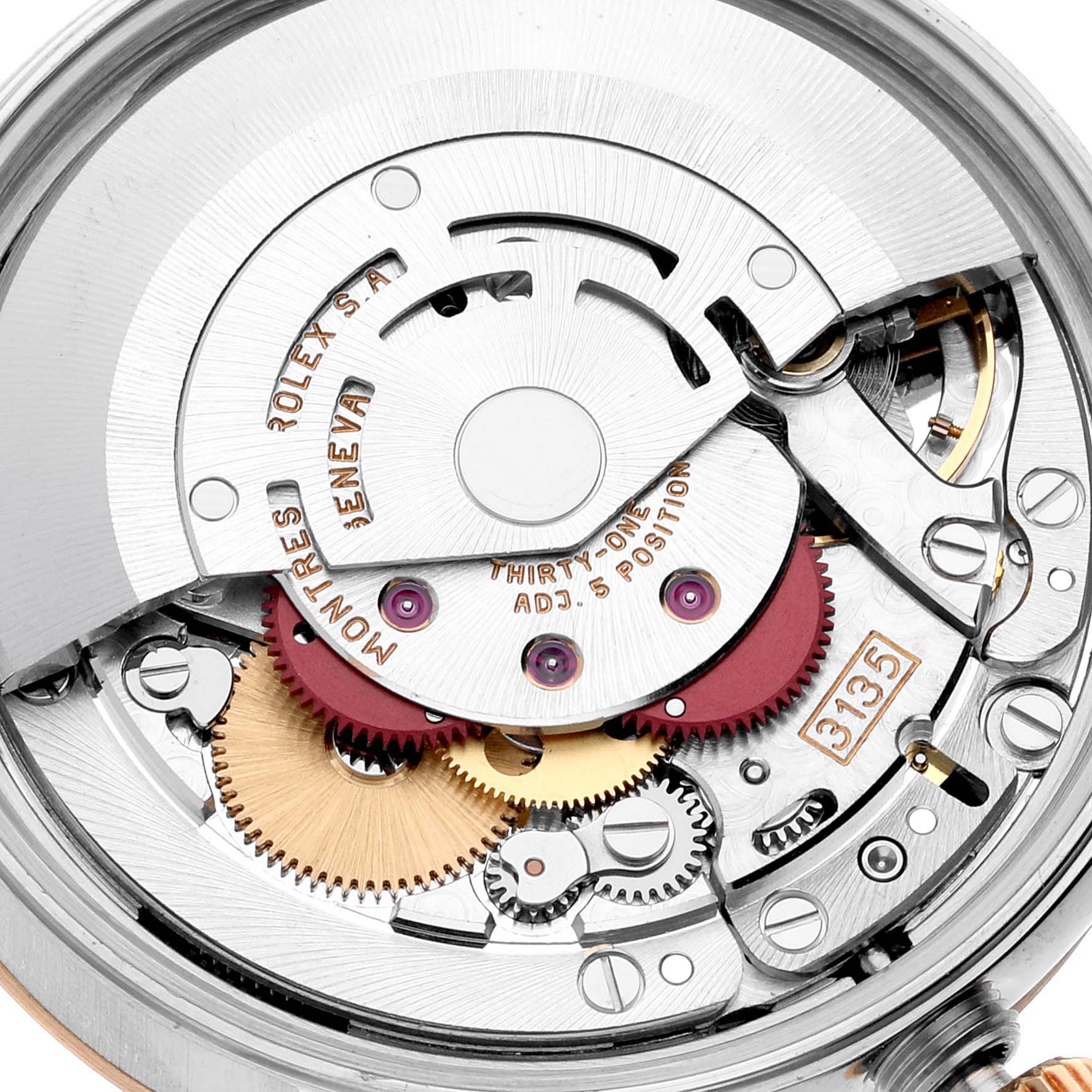 The image shows a close-up of the movement mechanism of a Rolex Date 15223 Men's Steel and Gold (two tone) Champagne Dial 15223 Men's Steel and Gold (two tone) Champagne Dial model watch.