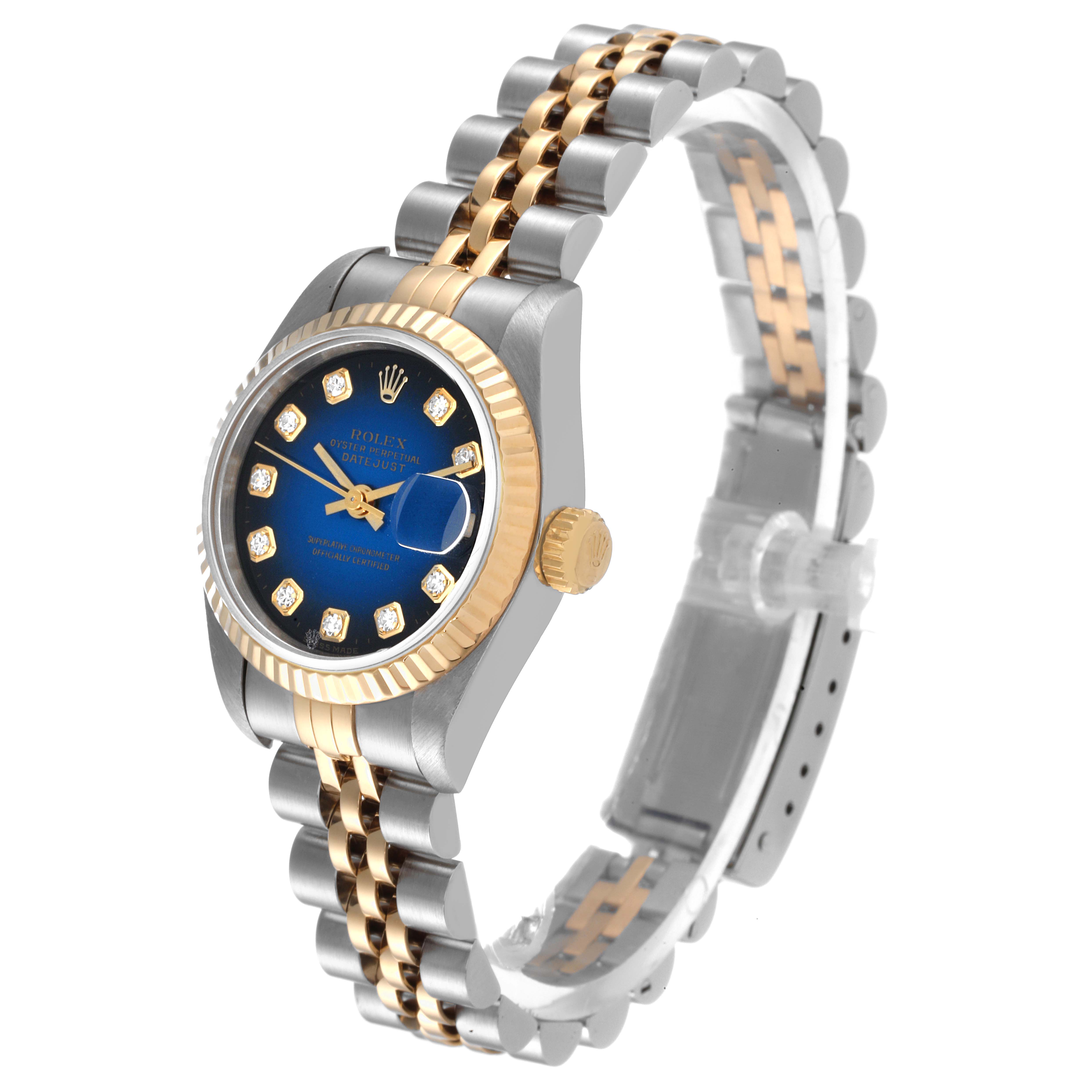 This Rolex Datejust 69173 Women's Steel and Gold (two tone) Blue Dial 69173 Women's Steel and Gold (two tone) Blue Dial watch is shown from a front-left angle, displaying its face, bezel, and two-tone bracelet.