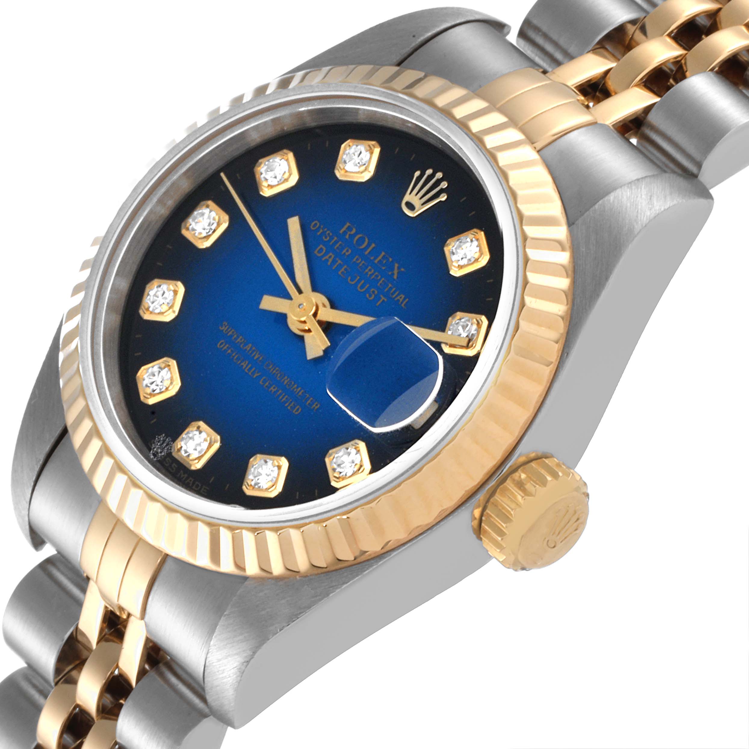 The image shows a close-up angled view of the Rolex Datejust 69173 Women's Steel and Gold (two tone) Blue Dial 69173 Women's Steel and Gold (two tone) Blue Dial watch, highlighting its blue dial, date window, and two-tone bracelet.