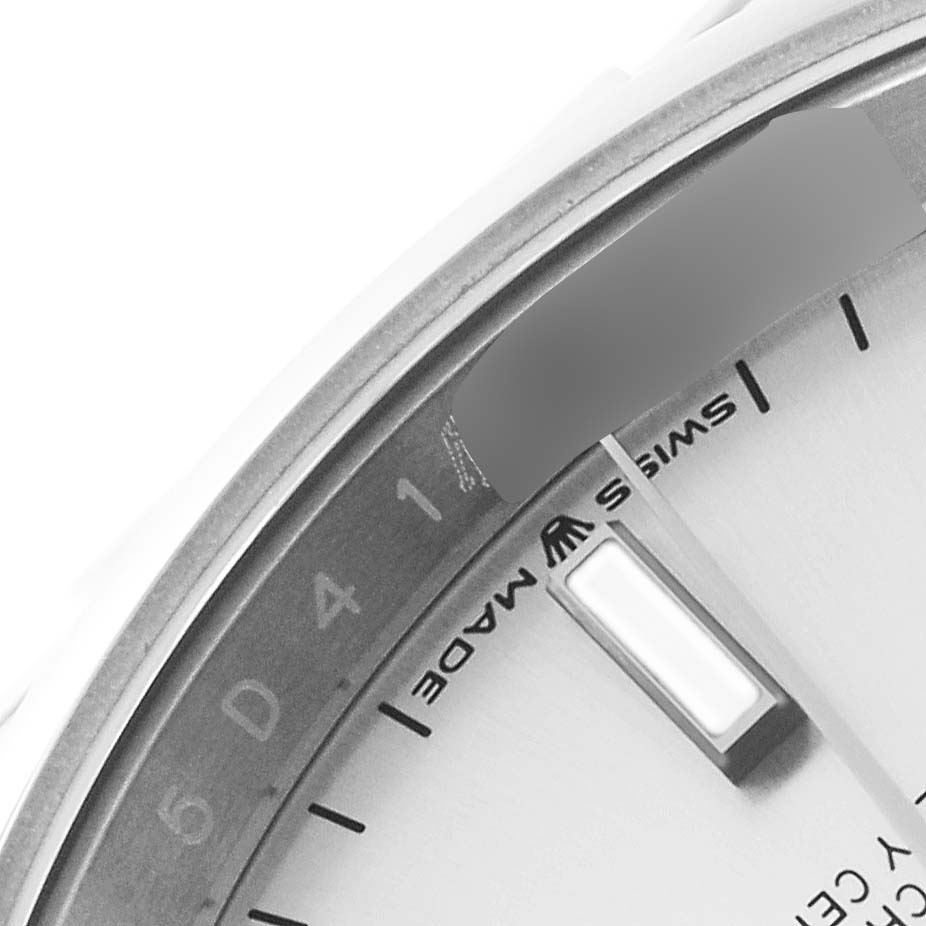 The image shows a close-up of the dial and date window of a Rolex Datejust 126200 Men's Stainless Steel Silver Dial 126200 Men's Stainless Steel Silver Dial watch, highlighting the Swiss Made text.