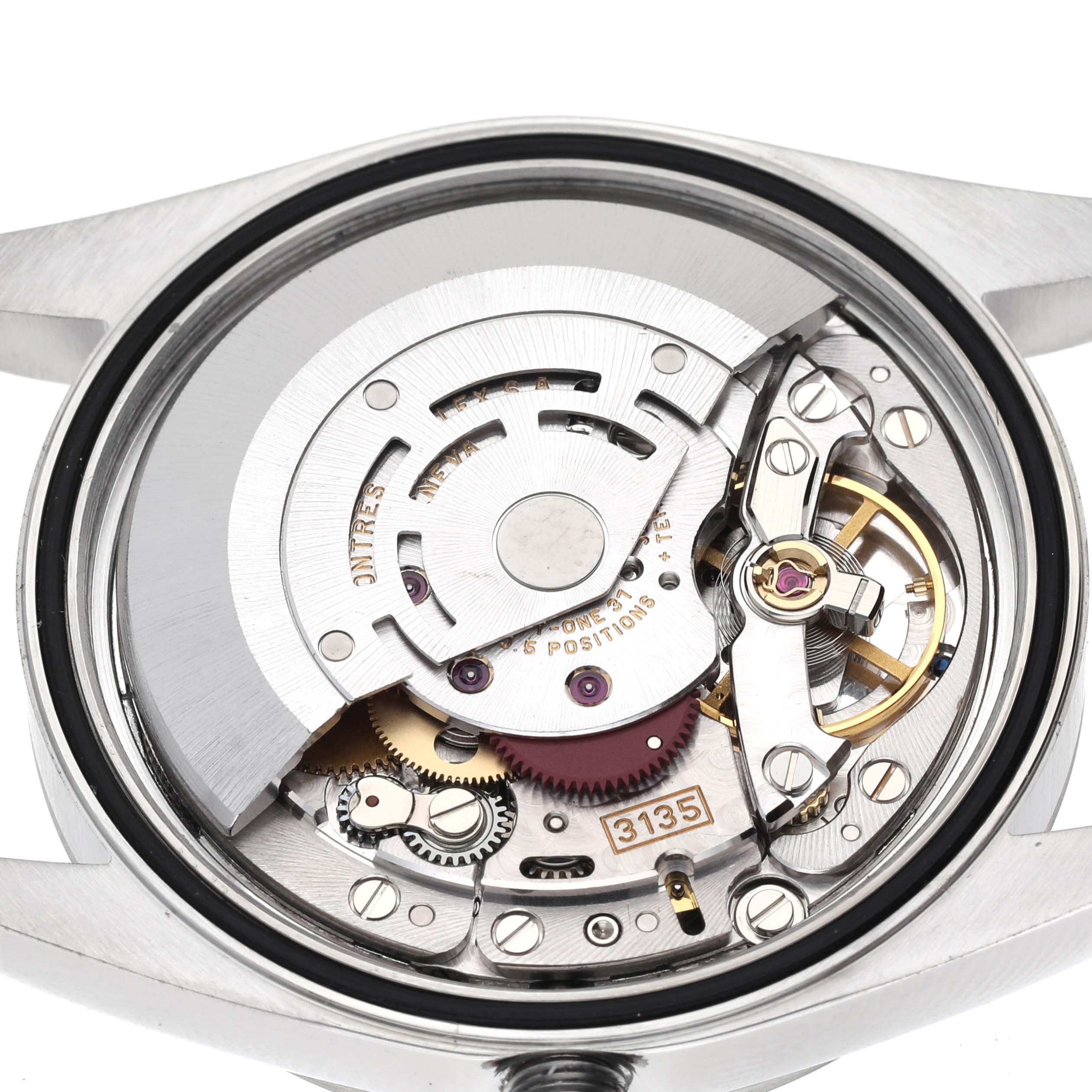 The image shows a close-up view of the movement mechanism of a Rolex Datejust 16200 Men
s Stainless Steel Silver Dial 16200 Men
s Stainless Steel Silver Dial watch.