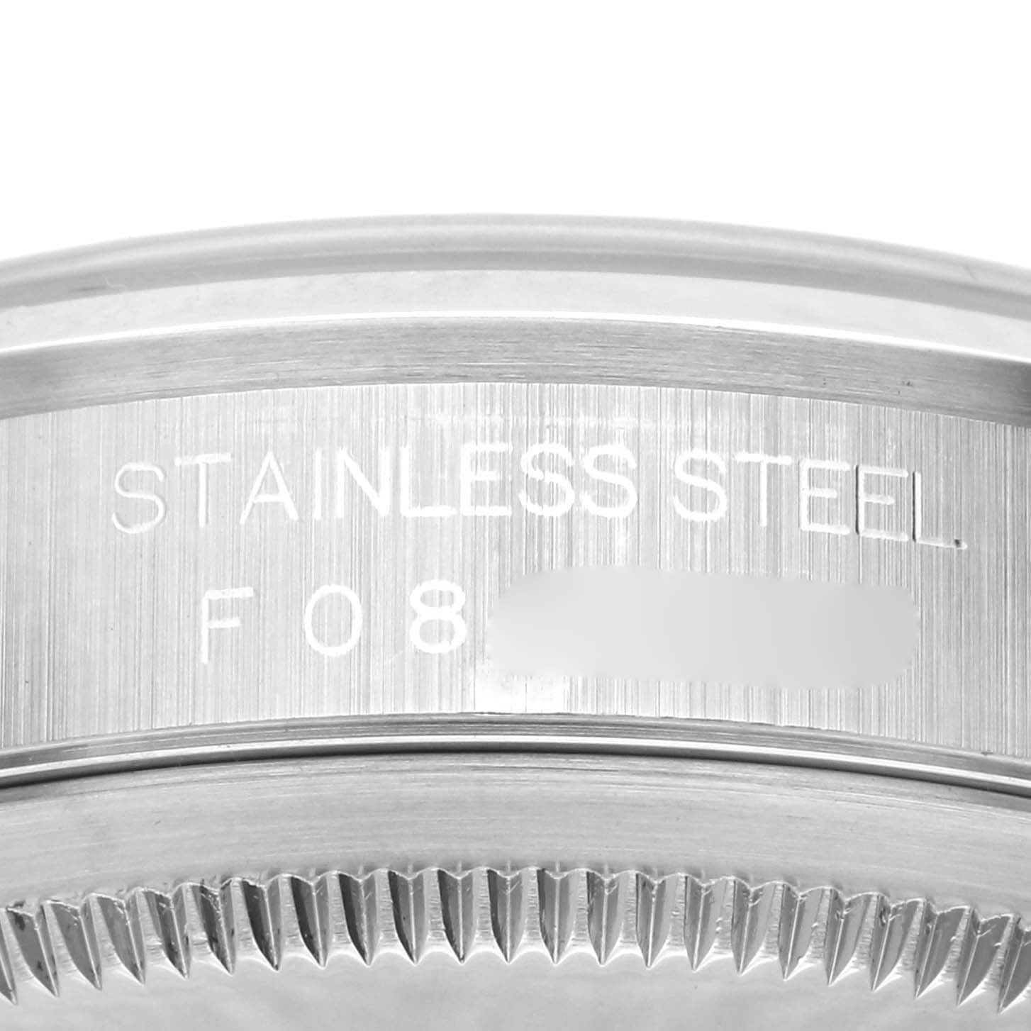 This is a close-up angle showing the side of the Rolex Datejust 16200 Men
s Stainless Steel Silver Dial 16200 Men
s Stainless Steel Silver Dial stainless steel casing with engraved details.