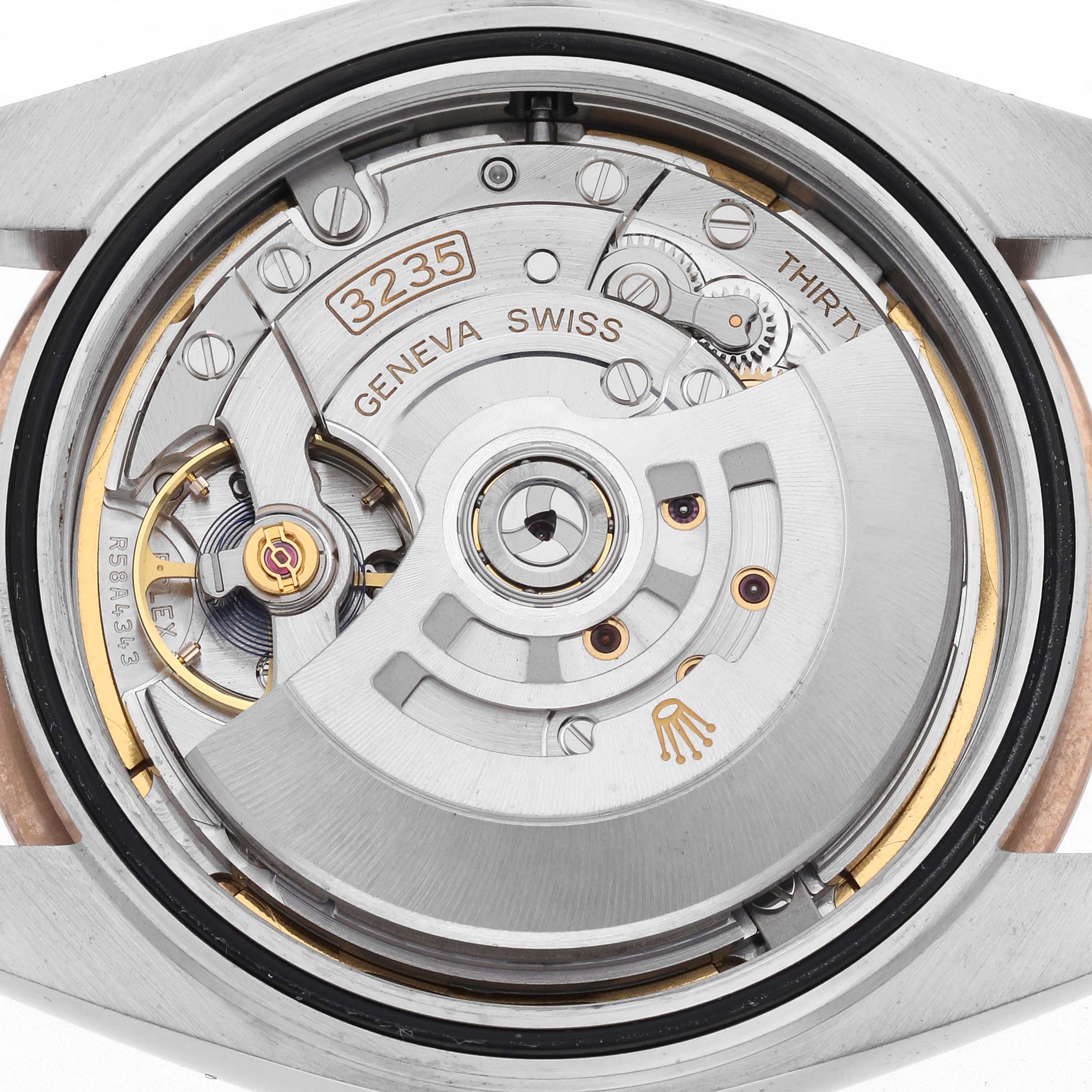 The image shows the movement mechanism of the Rolex Datejust 41 126331 Men
s Steel and Gold (two tone) Brown Dial model from a back angle without the case back.