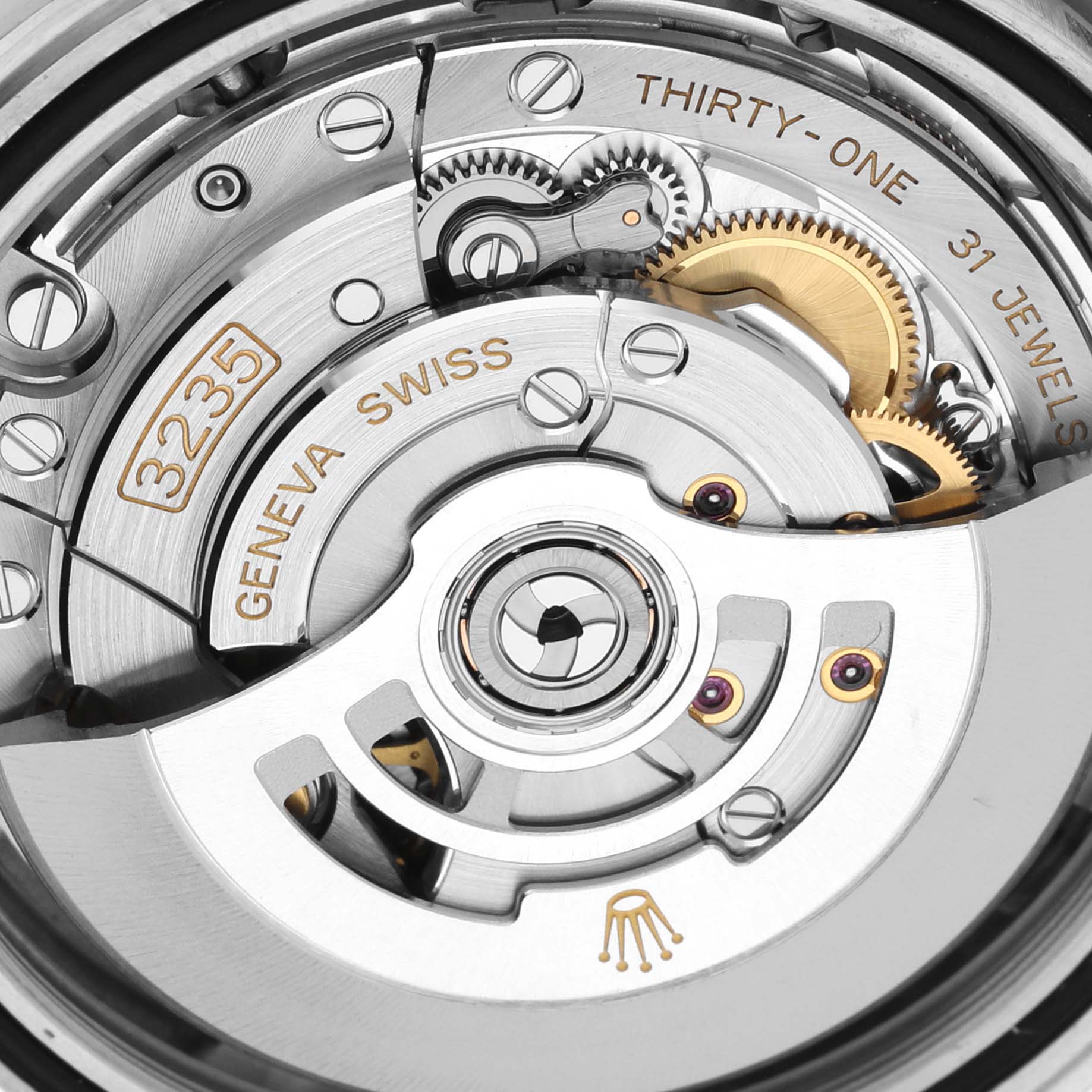 This image shows a close-up of the Rolex Datejust 41 126334 Men
s Stainless Steel Grey Dial 126334 Men
s Stainless Steel Grey Dial
s 3235 automatic movement with visible gears and jewels.