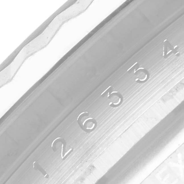 This close-up image shows the engraved serial numbers on the inner bezel of the Rolex Datejust 41 126334 Men
s Stainless Steel Grey Dial 126334 Men
s Stainless Steel Grey Dial watch.
