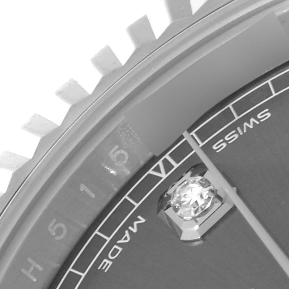 The image shows a close-up of the dial and bezel of the Rolex Datejust 41 126334 Men
s Stainless Steel Grey Dial 126334 Men
s Stainless Steel Grey Dial, highlighting the numeral markers and "SWISS MADE" text.