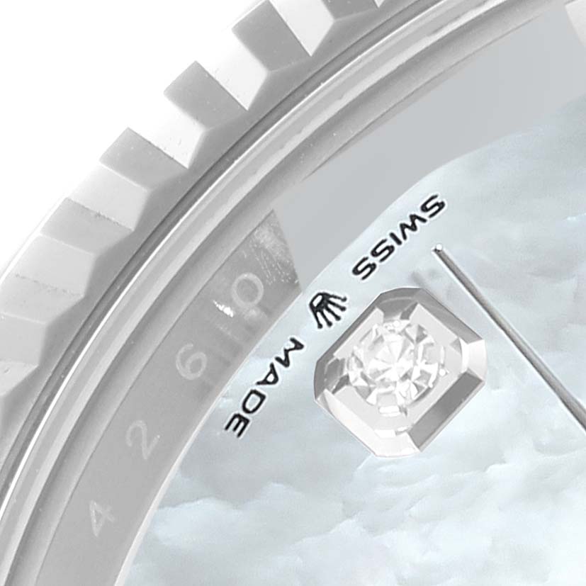 The image shows a close-up of the bezel, dial, and a diamond hour marker of the Rolex Datejust 126334 Men
s Stainless Steel Mother of Pearl Dial 126334 Men
s Stainless Steel Mother of Pearl Dial watch.