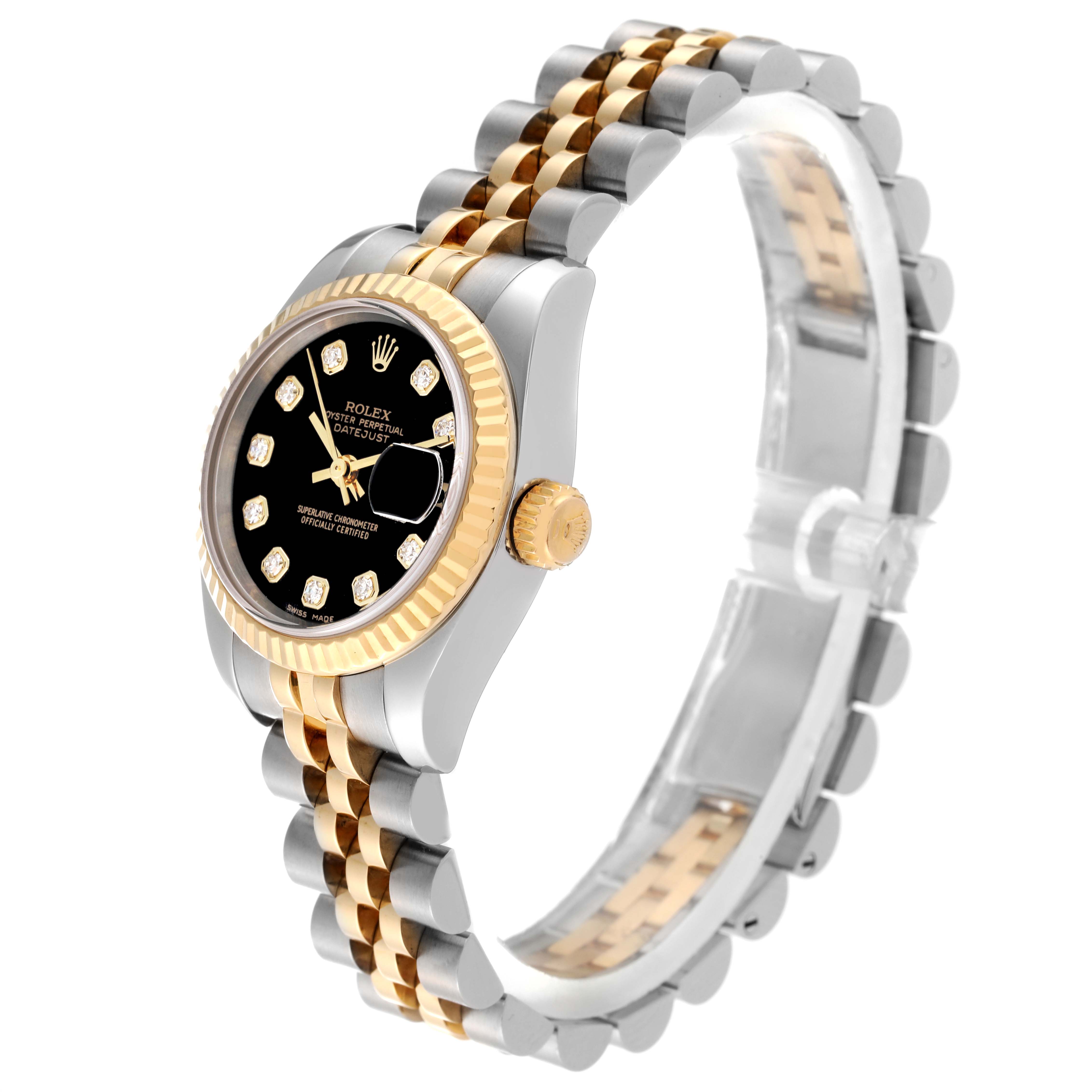 The image shows a side angle of a Rolex Datejust 179173 Women's Steel and Gold (two tone) Black Dial 179173 Women's Steel and Gold (two tone) Black Dial, highlighting its black dial, gold bezel, and two-tone bracelet.