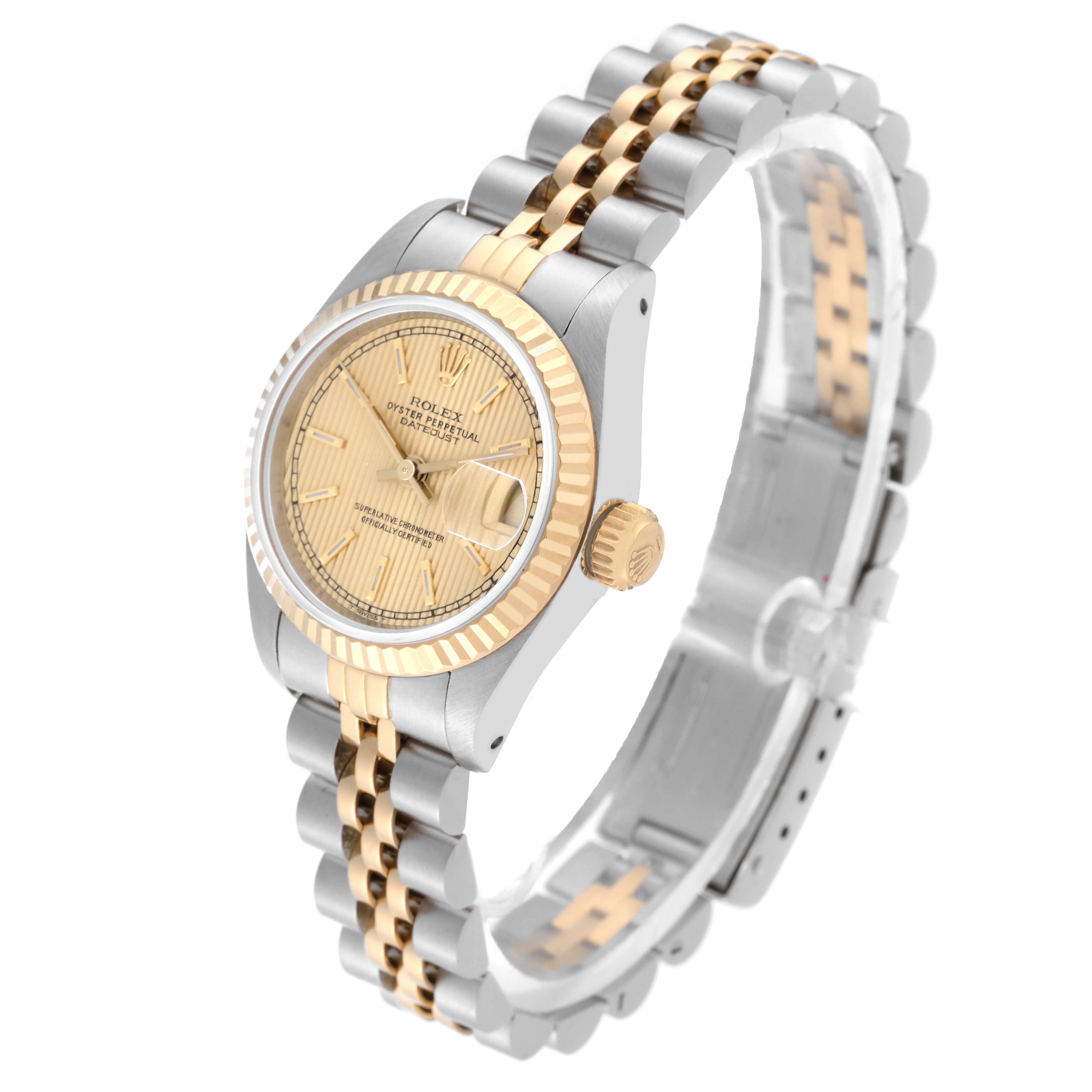 The image shows a Rolex Datejust 69173 Women's Steel and Gold (two tone) Champagne Dial 69173 Women's Steel and Gold (two tone) Champagne Dial watch at an angled view, highlighting its two-tone bracelet, fluted bezel, and champagne dial.