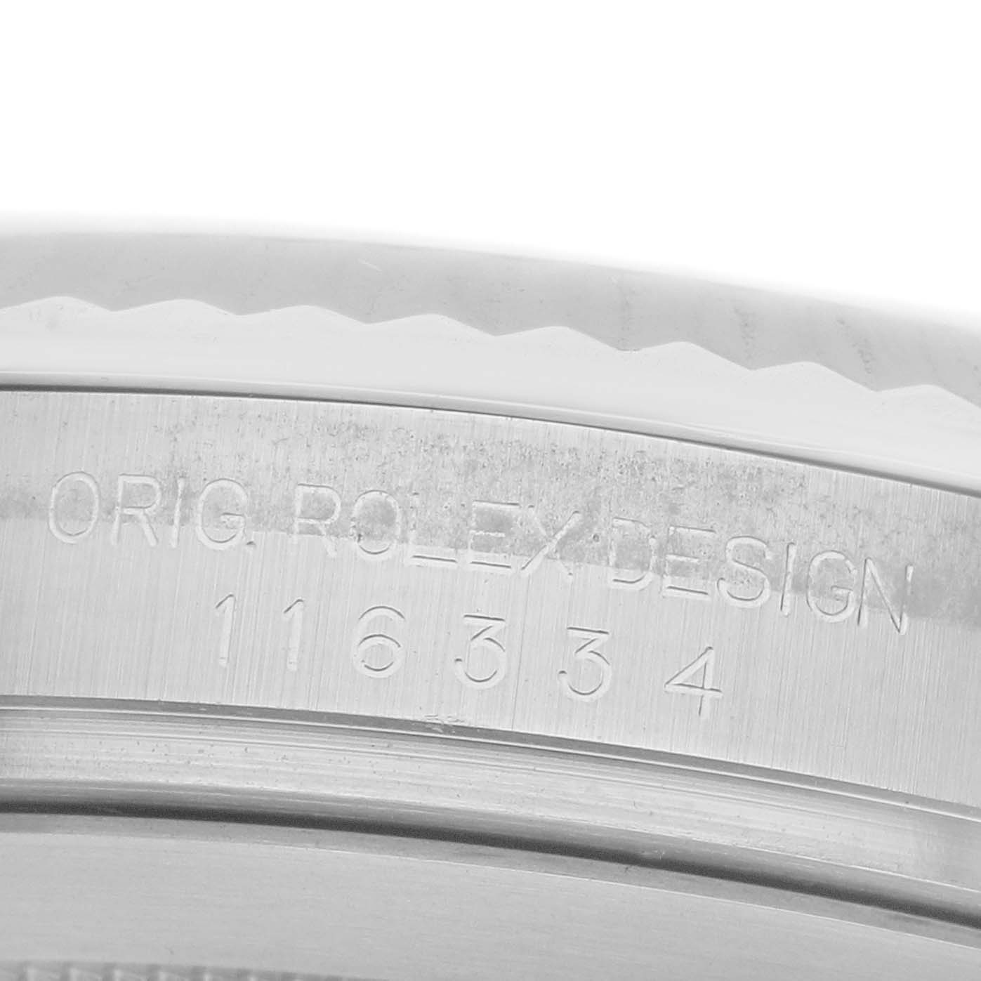 The image shows a close-up of the engraved inner bezel of a Rolex Datejust 41 116334 Men's Stainless Steel Silver Dial, featuring "Orig. Rolex Design" and model numbers.