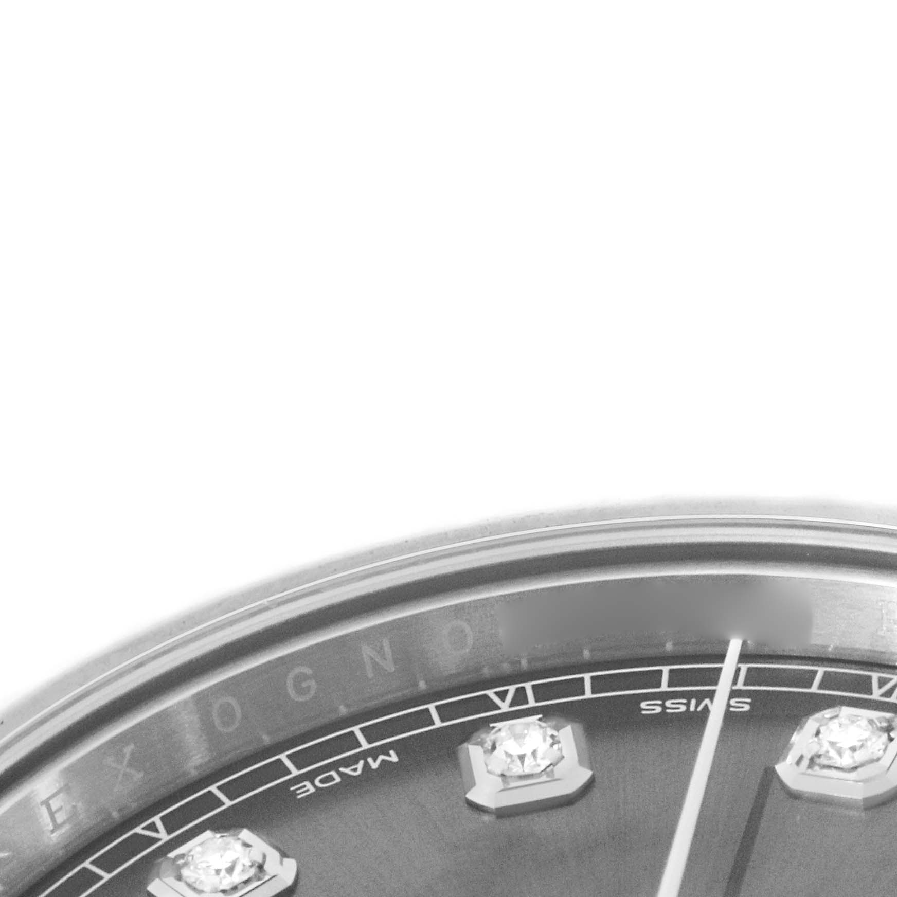 The image shows a close-up of the dial on a Rolex Datejust 41 116334 Men's Stainless Steel Silver Dial, highlighting diamond hour markers and part of the watch face edge.