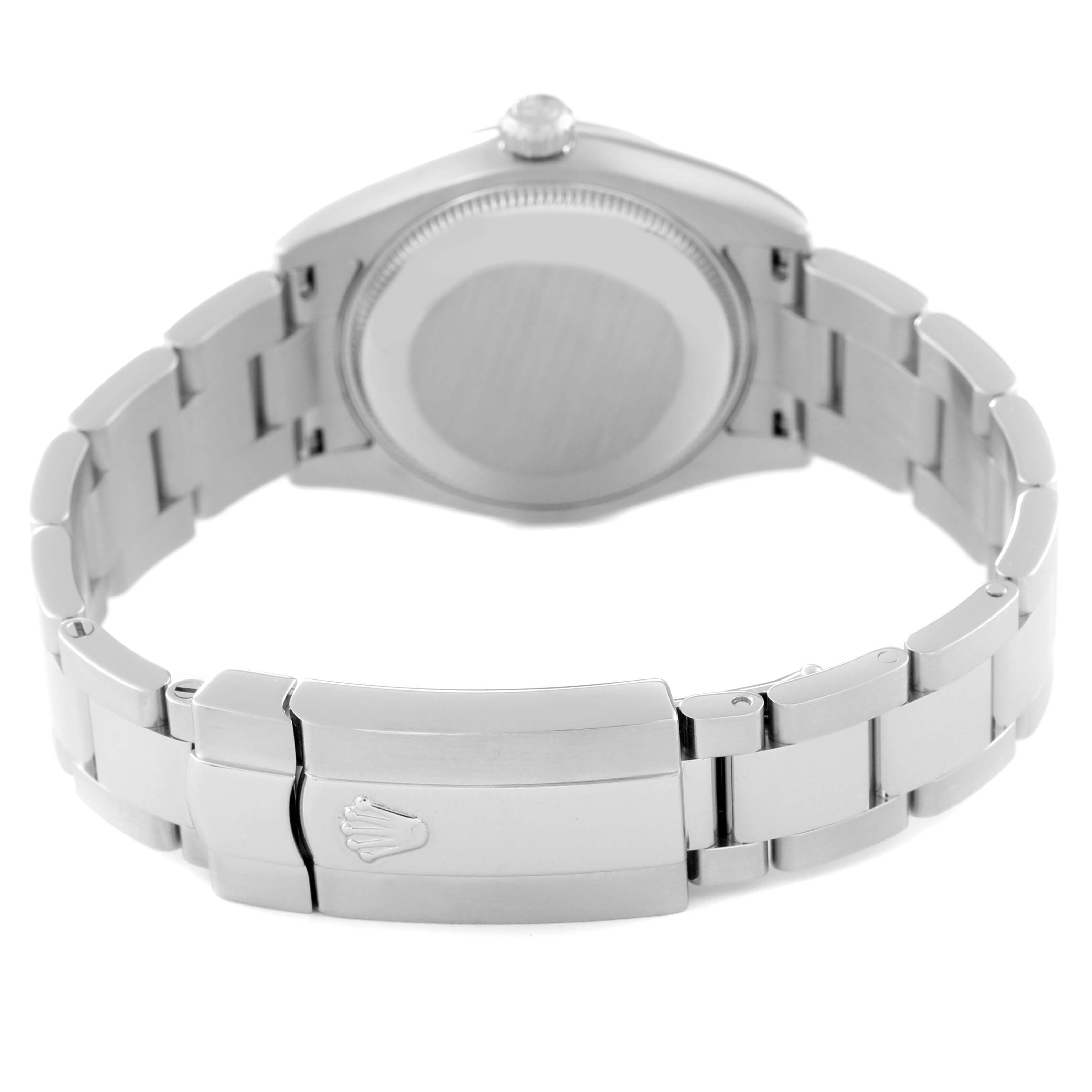 The image shows the back case and clasp of a Mid-Size Rolex watch, showcasing its bracelet and logo-engraved clasp.