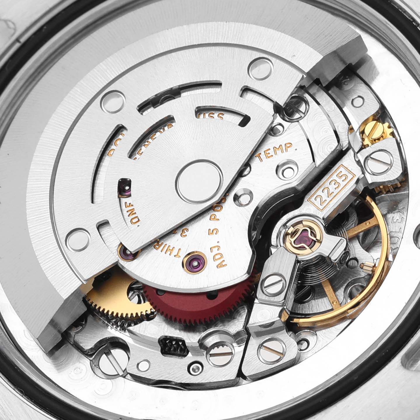The image shows an internal view of a Rolex Mid-Size 178240 Women's Stainless Steel Silver Dial 178240 Women's Stainless Steel Silver Dial watch model, highlighting its intricate movement components and mechanisms.