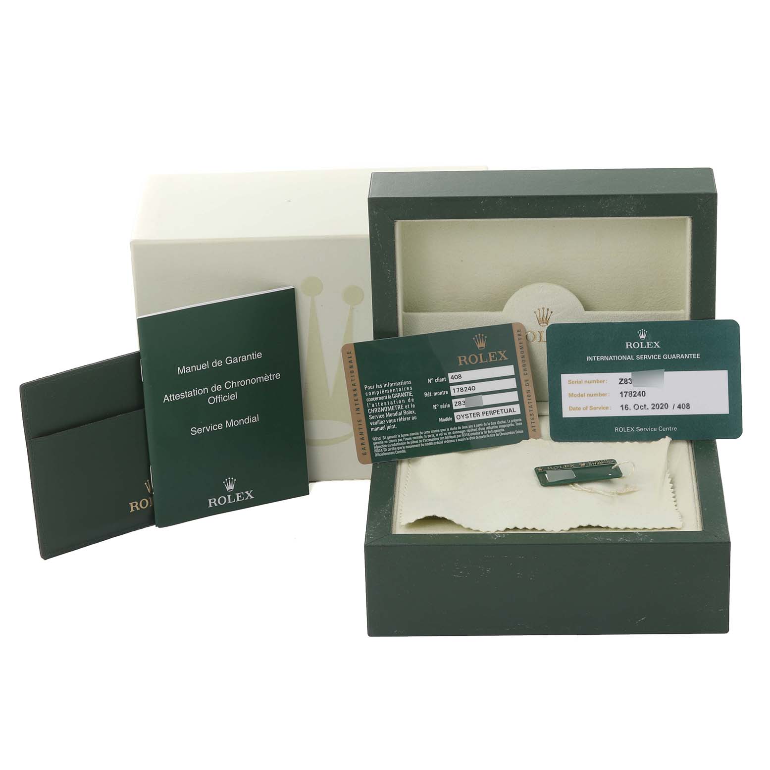 The image shows the packaging, guarantee cards, manuals, and accessories for a Rolex Mid-Size 178240 Women's Stainless Steel Silver Dial 178240 Women's Stainless Steel Silver Dial model watch.