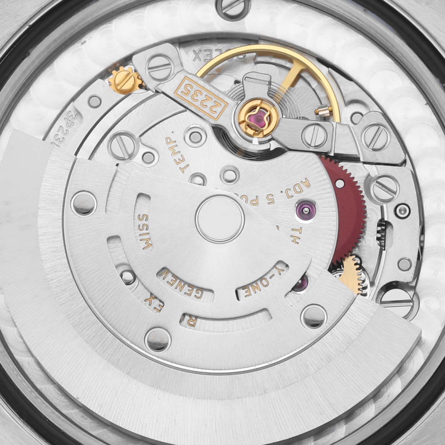 This image shows a close-up of the movement of a Rolex Mid-Size 178274 Women's Stainless Steel Mother of Pearl Dial 178274 Women's Stainless Steel Mother of Pearl Dial model watch from the back, highlighting the intricate mechanics.