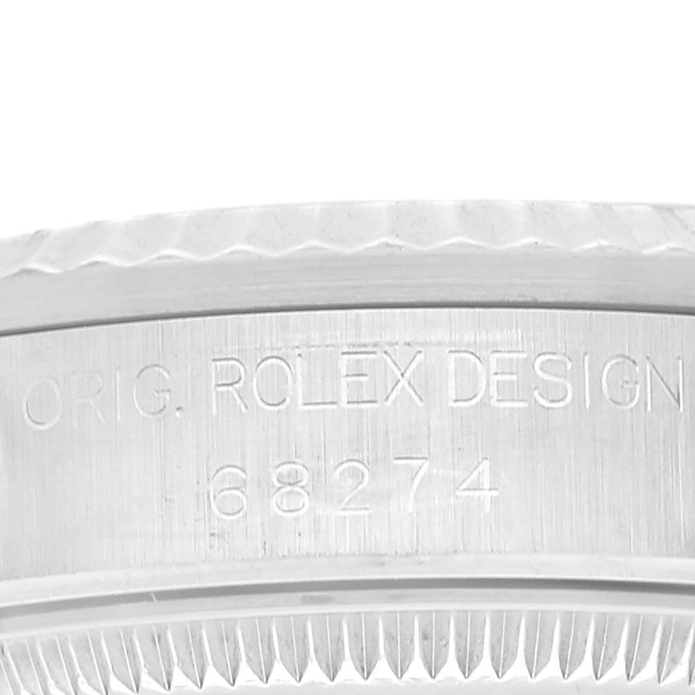 This image shows a close-up of the case side engraving on a Mid-Size Rolex watch featuring model number 68274.