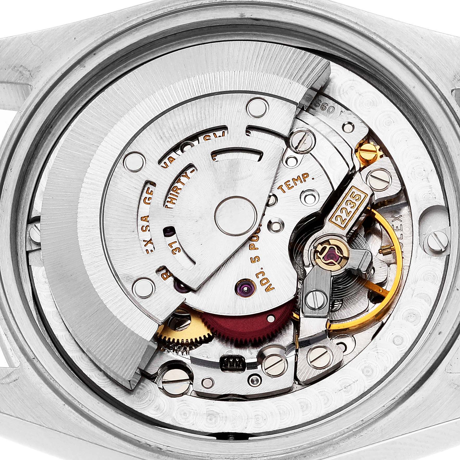 This image shows a close-up of the movement mechanism of a Rolex Mid-Size 78274 Women's Stainless Steel Blue Dial 78274 Women's Stainless Steel Blue Dial watch.