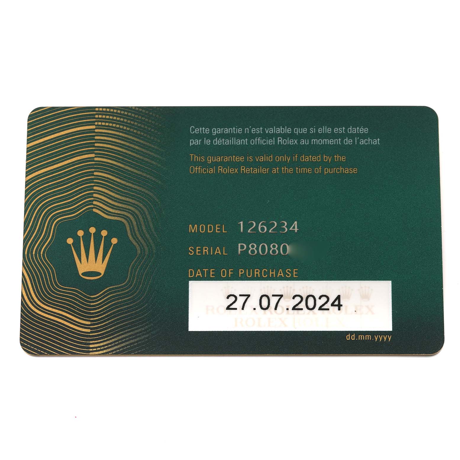 This is a close-up of the warranty card for a Rolex Datejust 126234 Men's Stainless Steel Green Dial 126234 Men's Stainless Steel Green Dial model 126234.