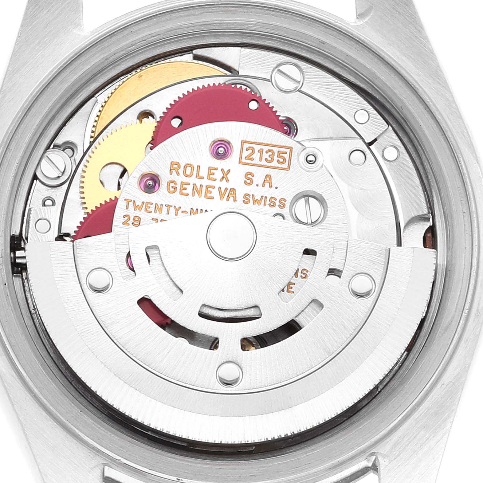 The image shows the exposed movement of a Rolex Datejust 69174 Women's Stainless Steel Pink Dial 69174 Women's Stainless Steel Pink Dial watch, highlighting the mechanical components.