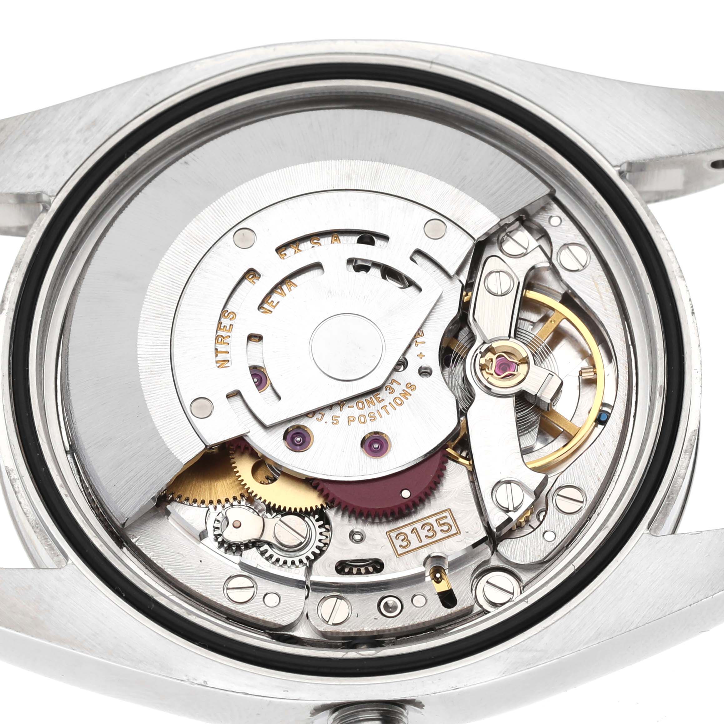 This image shows the movement assembly of a Rolex Datejust 116234 Men
s Stainless Steel Silver Dial 116234 Men
s Stainless Steel Silver Dial watch from a back angle with the case back removed.