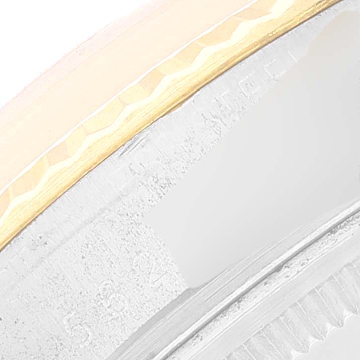 This image shows a close-up of the bezel and case of a Vintage Collection model by Rolex.