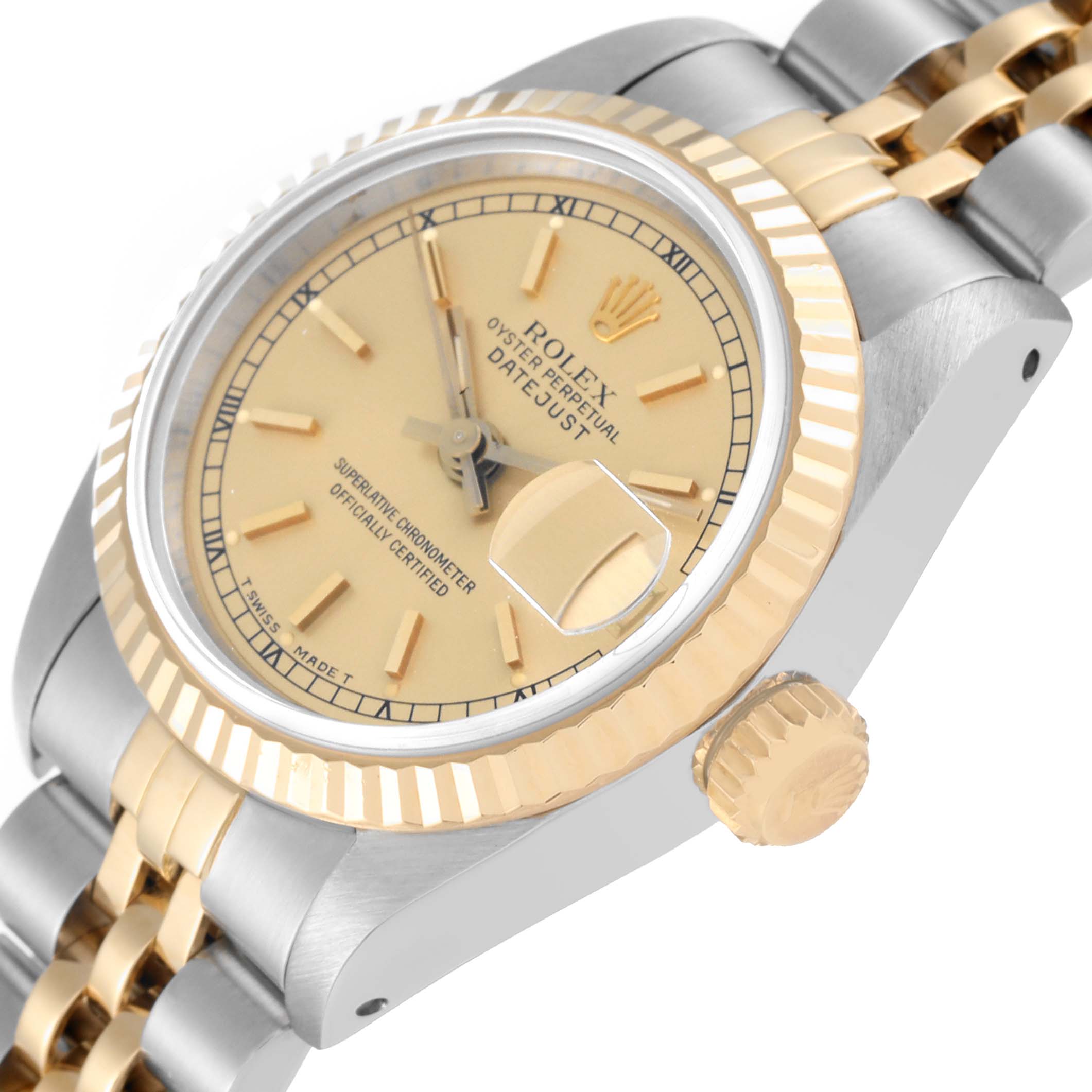 The image shows a close-up angled view of the Rolex Datejust 69173 Women's Steel and Gold (two tone) Champagne Dial 69173 Women's Steel and Gold (two tone) Champagne Dial watch, highlighting the dial, fluted bezel, crown, and part of the bracelet.