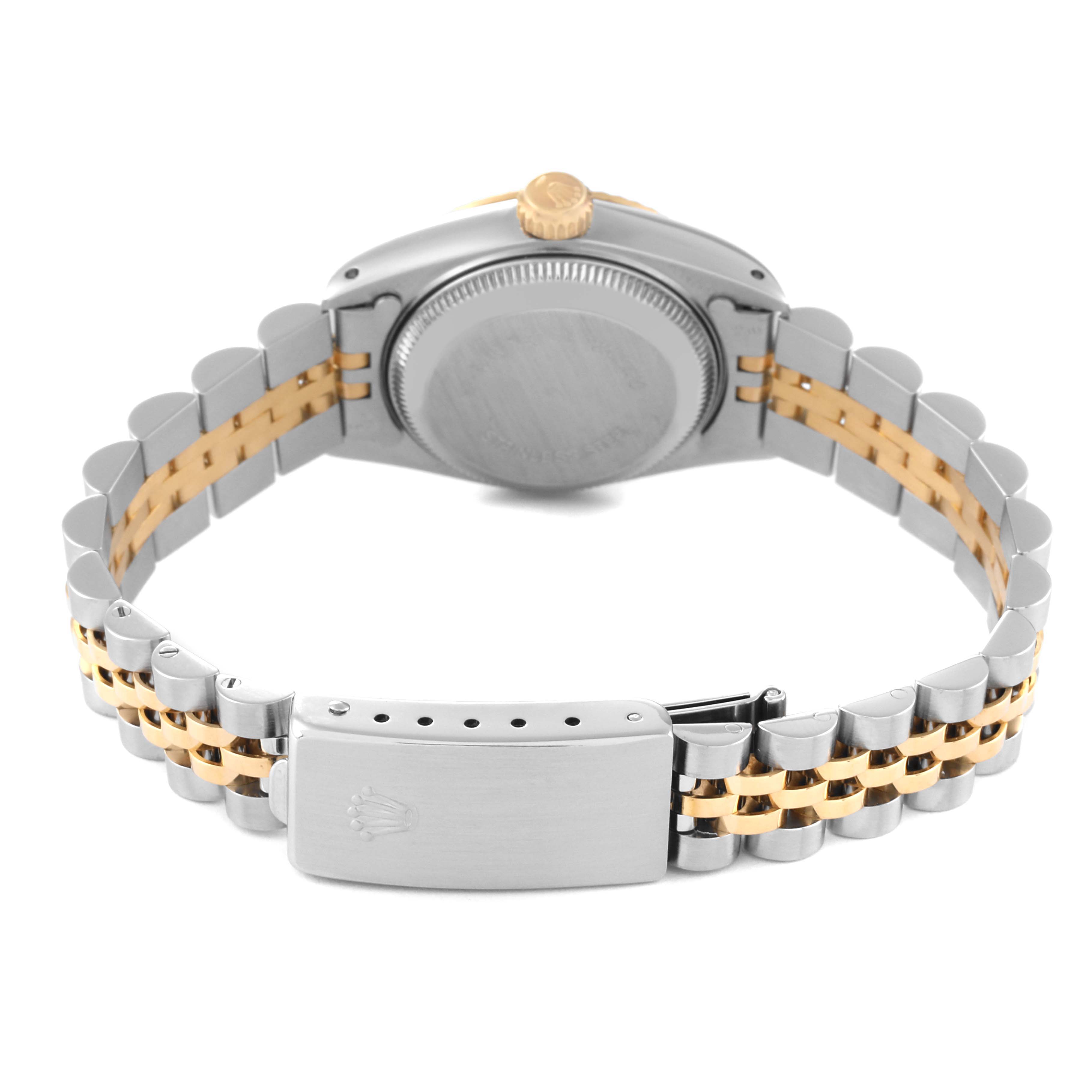 This image shows the back view of a Rolex Datejust 69173 Women's Steel and Gold (two tone) Champagne Dial 69173 Women's Steel and Gold (two tone) Champagne Dial watch, highlighting its case back and two-tone bracelet with the clasp open.