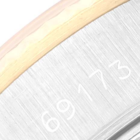 The image shows a close-up of the Rolex Datejust 69173 Women's Steel and Gold (two tone) Champagne Dial 69173 Women's Steel and Gold (two tone) Champagne Dial model's bezel and case, displaying the engraved model number 69173.