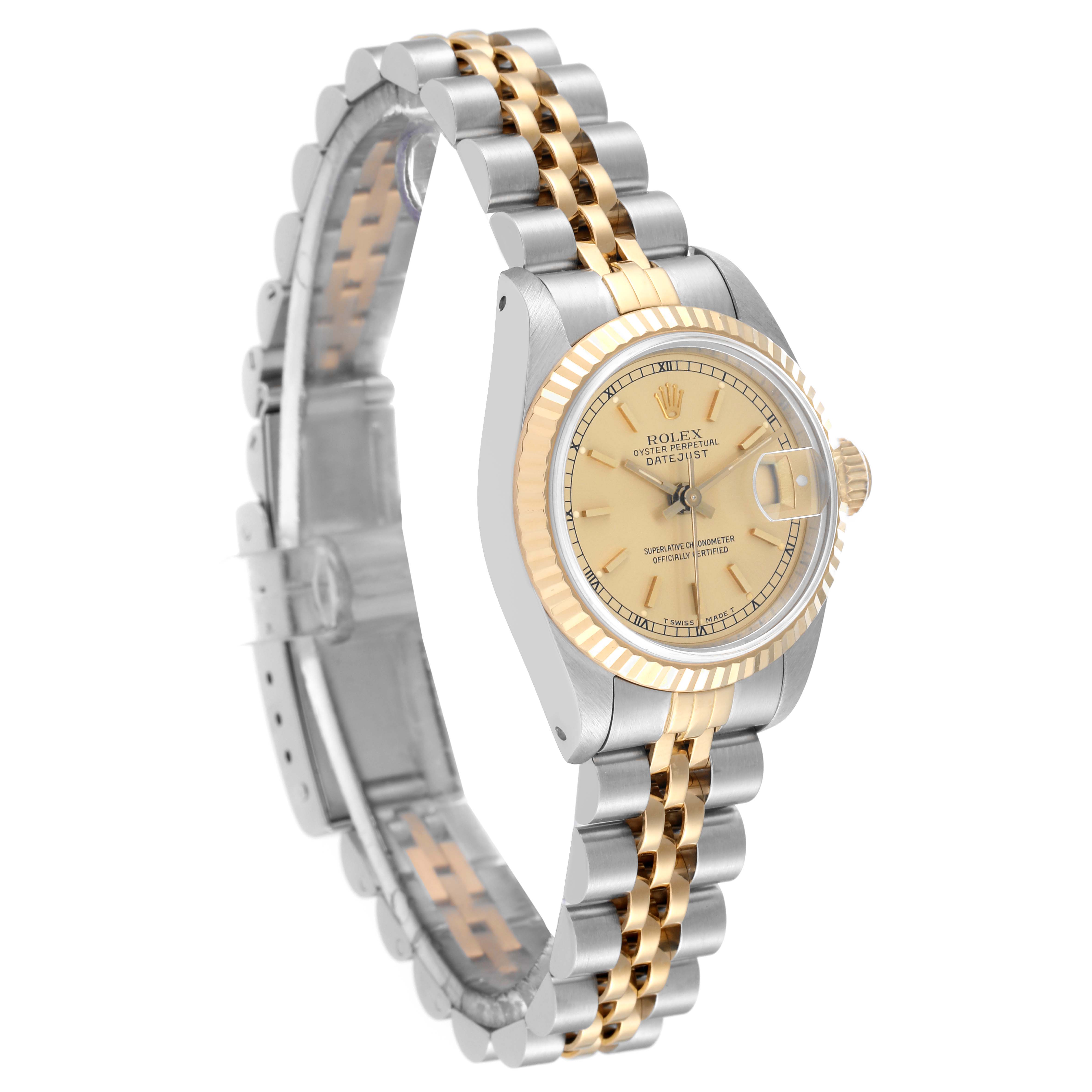 This image shows a Rolex Datejust 69173 Women's Steel and Gold (two tone) Champagne Dial 69173 Women's Steel and Gold (two tone) Champagne Dial watch at an angle highlighting the dial, bezel, and two-tone bracelet.