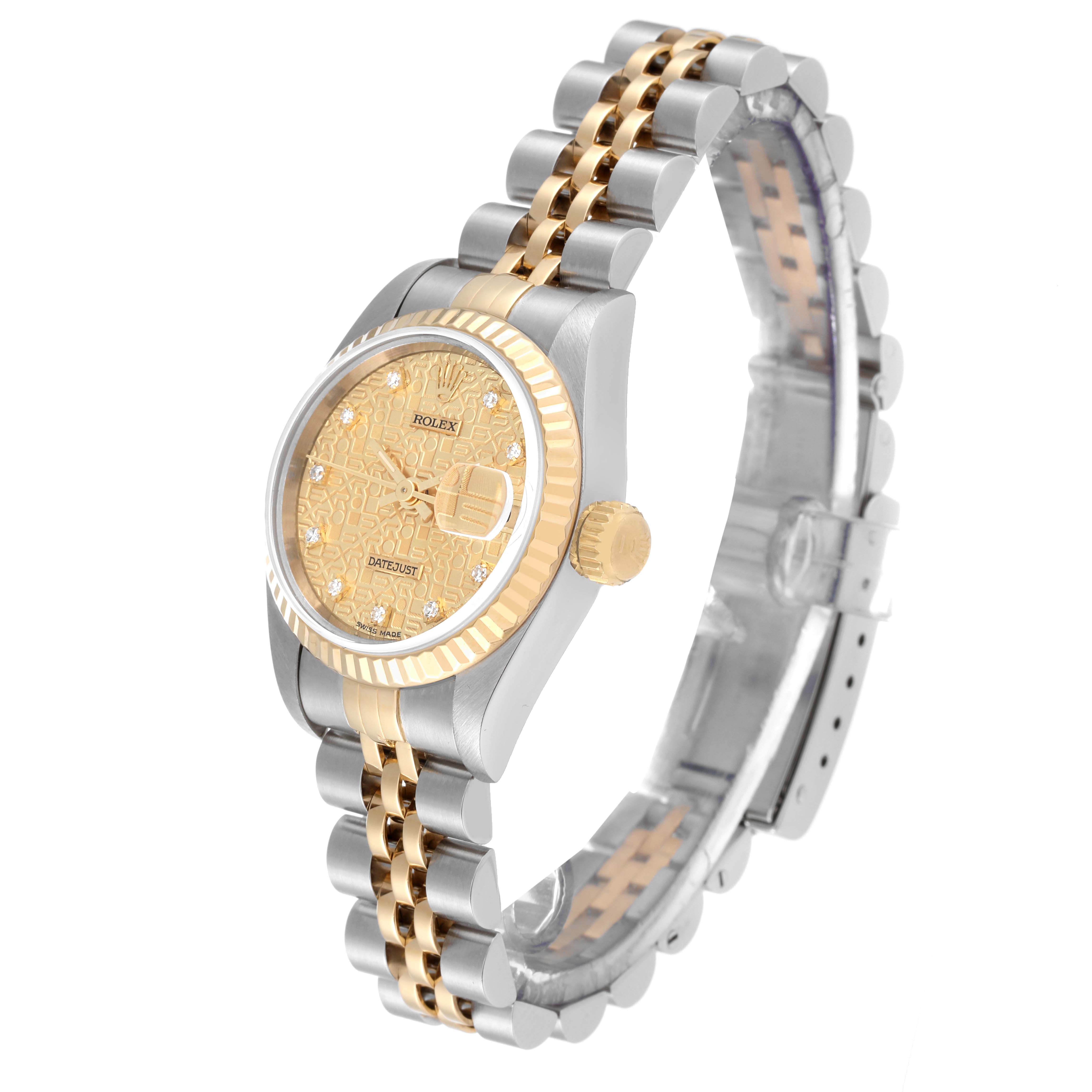 The image shows a side and front angle of a Rolex Datejust 69173 Women's Steel and Gold (two tone) Champagne Dial 69173 Women's Steel and Gold (two tone) Champagne Dial watch with a patterned gold dial and a two-tone bracelet.