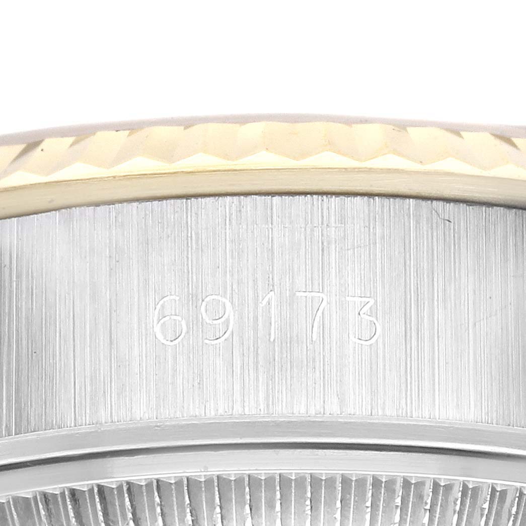This is a close-up image of the side of a Rolex Datejust 69173 Women's Steel and Gold (two tone) Champagne Dial 69173 Women's Steel and Gold (two tone) Champagne Dial model showing the reference number 69173.