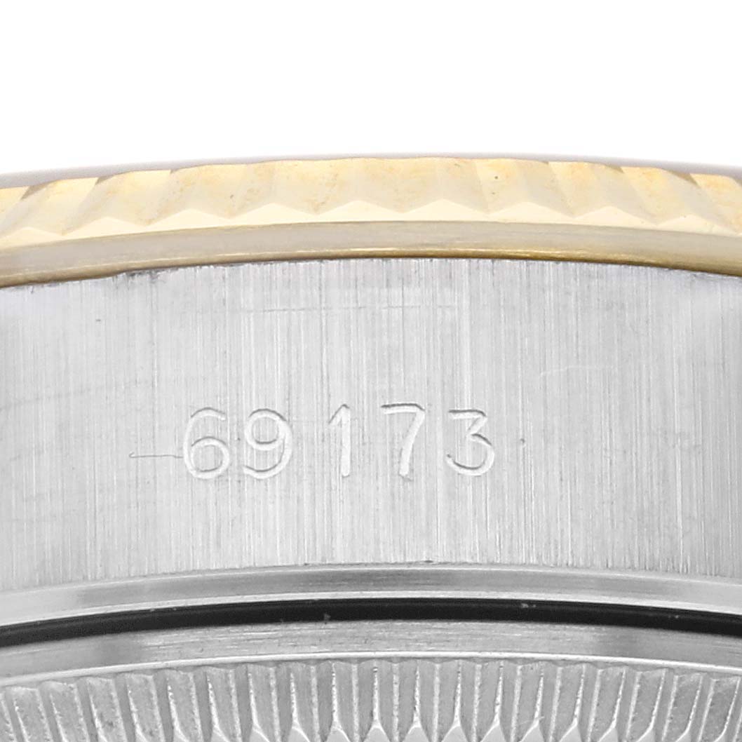 The close-up image shows the engraved model number "69173" on the case of a Rolex Datejust 69173 Women's Steel and Gold (two tone) Champagne Dial 69173 Women's Steel and Gold (two tone) Champagne Dial watch.