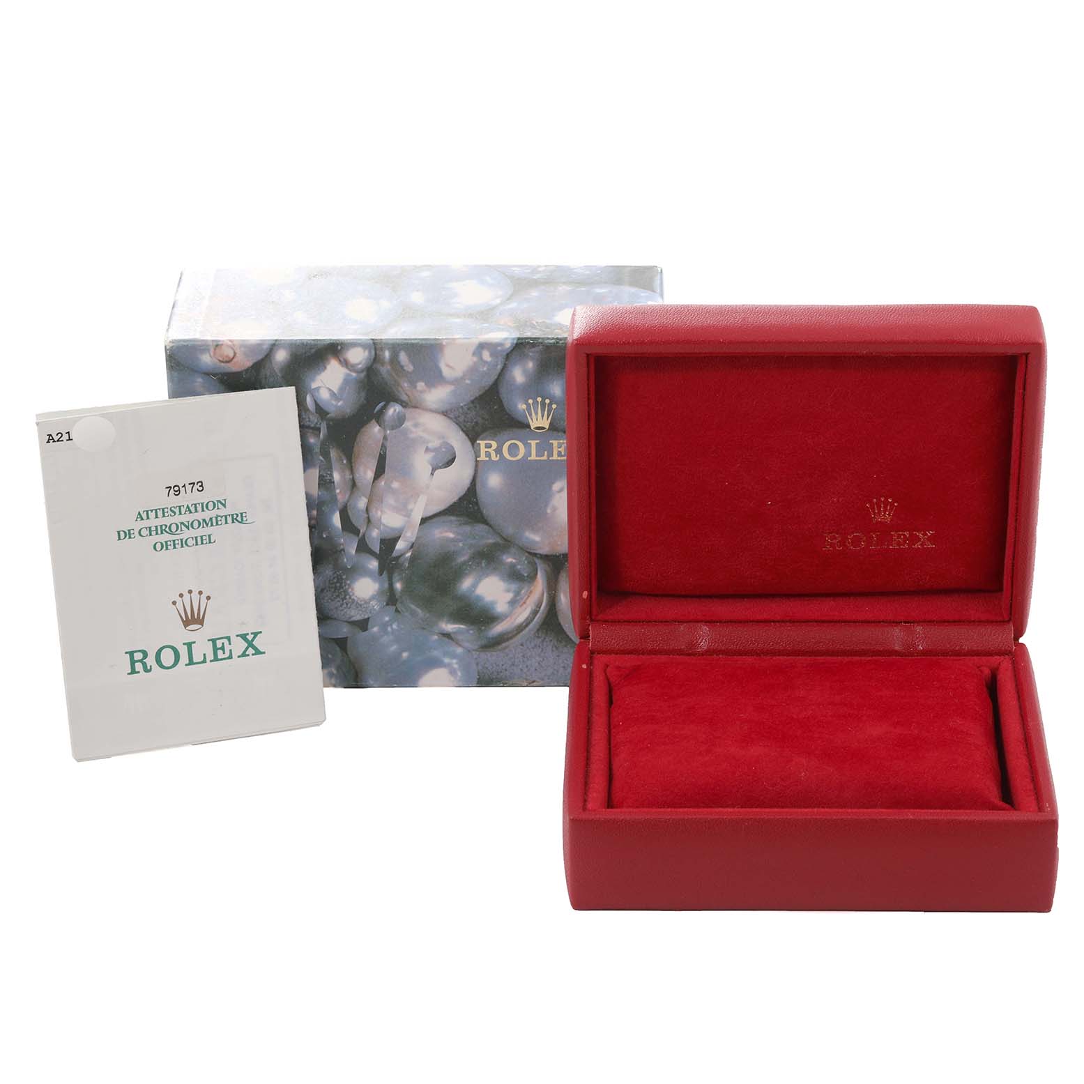 The image shows the packaging for a Rolex Datejust 79173 Women's Steel and Gold (two tone) Champagne Dial 79173 Women's Steel and Gold (two tone) Champagne Dial, including a red box, a manual, and an outer decorative box.