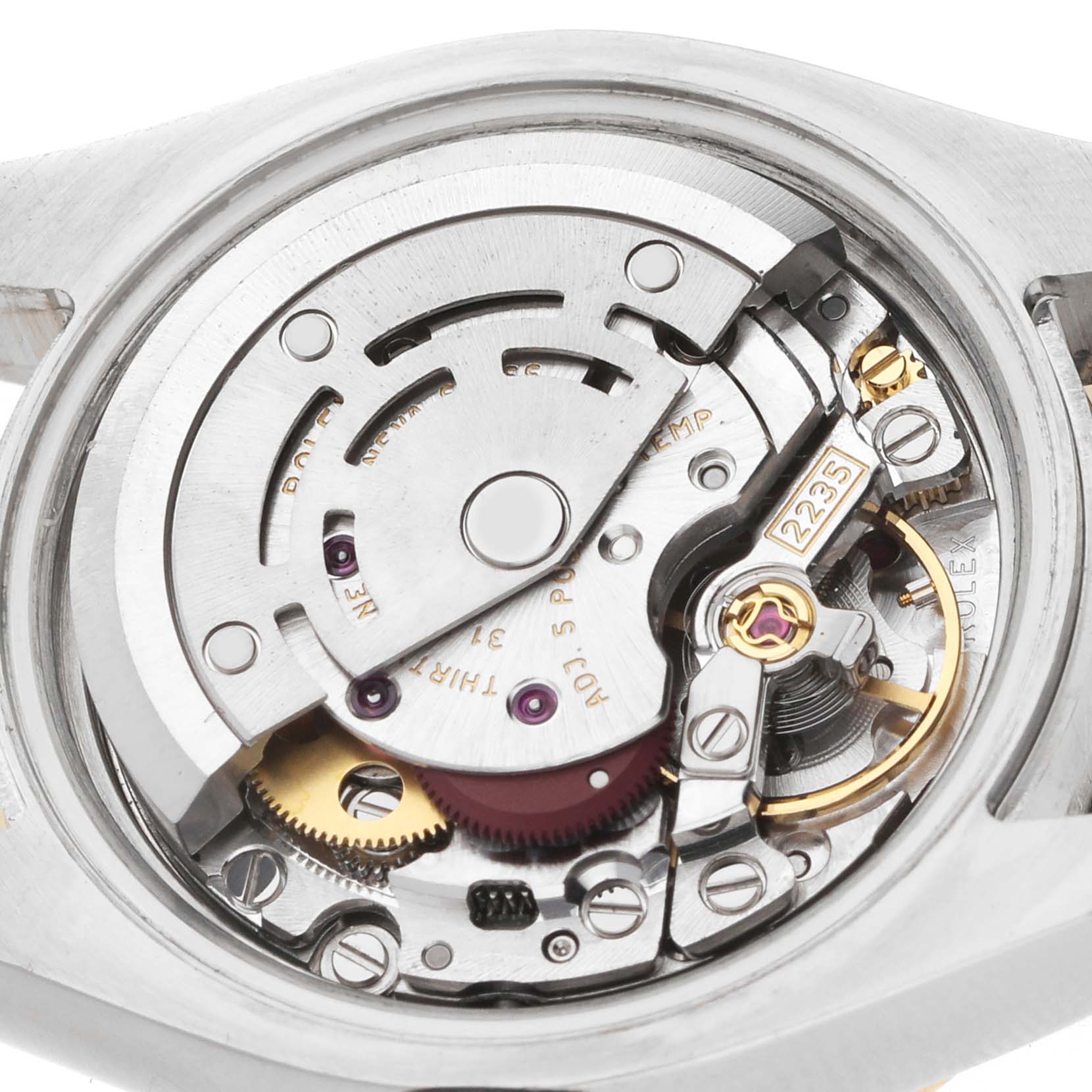 The Rolex Datejust 179383 Women's Steel and Gold (two tone) Mother of Pearl Dial model is shown from the back, displaying its intricate movement and inner mechanical parts.